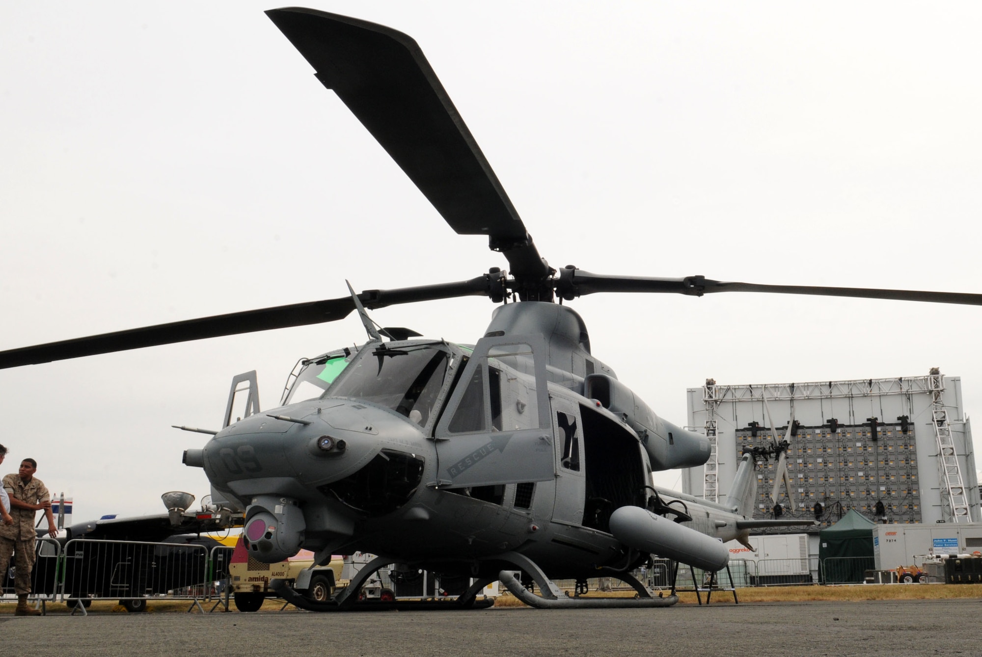 FARNBOROUGH, England – Marines from the Light Attack Helicopter Squadron 367 (HMLA 367), Camp Pendleton, California, display the UH-1Y Venom at the Farnborough International Air Show July 20. The UH-1Y was introduced in 2008 and is known as a true utility helicopter that meets many mission requirements including command and control, escort, reconnaissance, troop transport, medical evacuation and close air support. The team of ten Marines joined approximately 70 other aircrew and support personnel from bases in Europe and the United States to participate in this global iconic event. (U.S. Air Force photo/ Staff Sgt. Jerry Fleshman)

