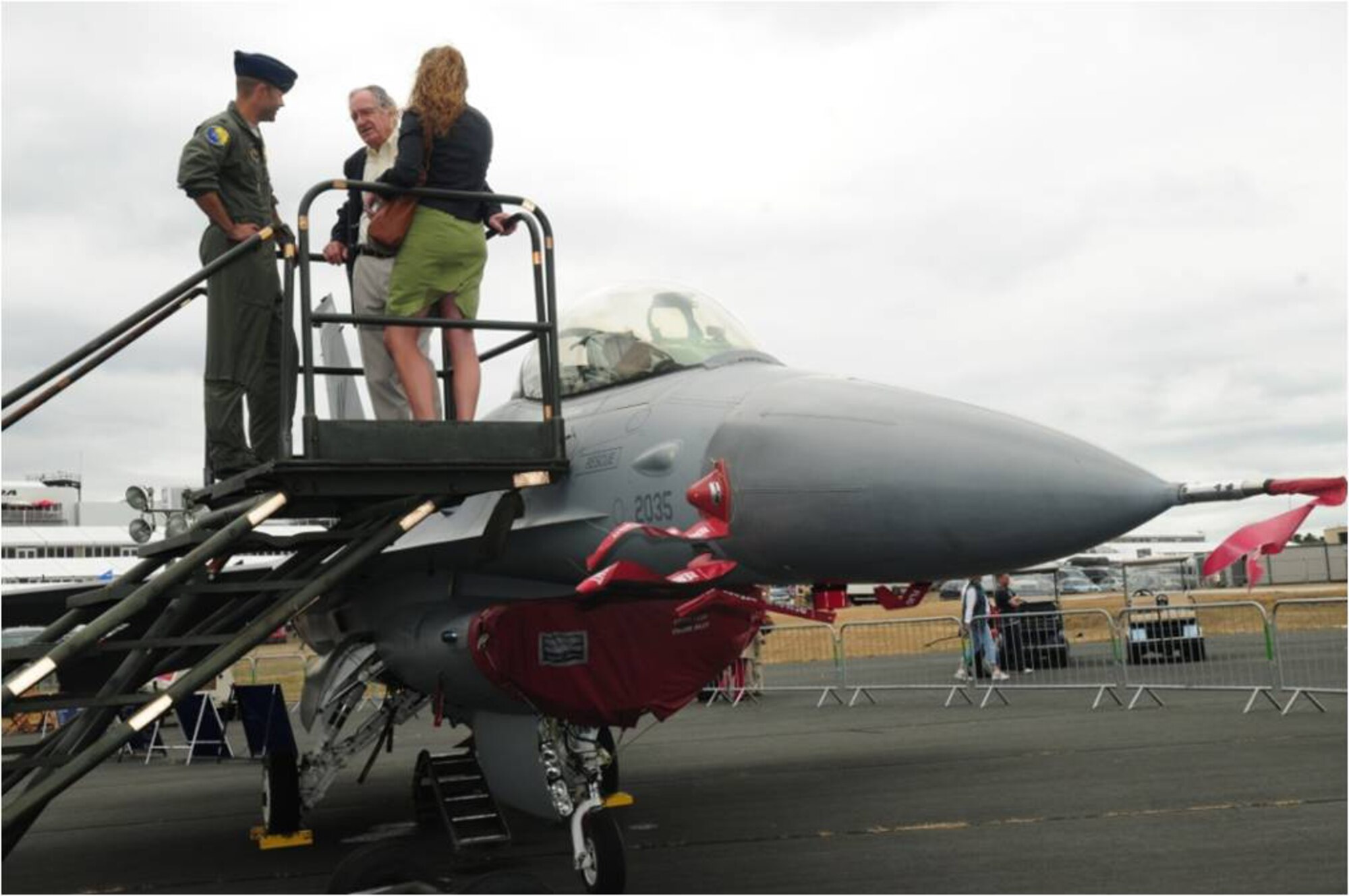 Tom Harkin, Iowa senator, tours the F-16C in the U.S. static display coral at the Farnborough International Air Show July 18. He and four other senators spent time talking with U.S. servicemembers and viewing the various aircraft on display. (U.S. Air Force photo/Staff Sgt. Heather M. Norris)