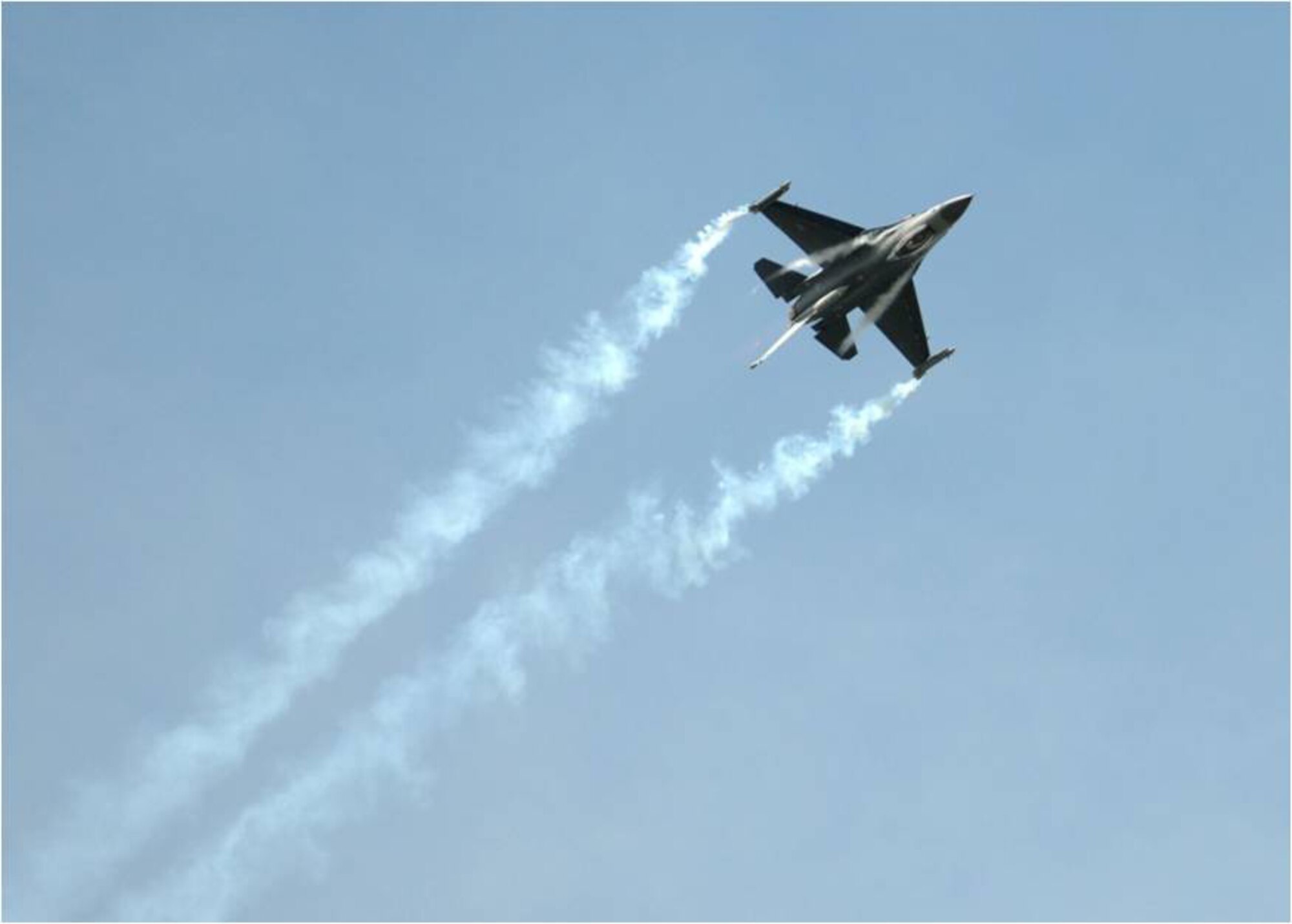An Air Force F-16C Fighting Falcon from the 31st Fighter Wing, Aviano Air Base, Italy, performs aerial acrobatics for more than 285,000 aviation enthusiasts during the Farnborough International Air Show July 21. Most commonly known as the “Viper,” this compact multi-role fighter has proven itself by dominating in air-to-air and air-to-ground combat. The F-16C’s exceptional handling and maneuvering capabilities allow the aircraft to pull upwards of 9 G’s. Approximately 70 aircrew and support personnel from bases across Europe and the United States participated in the air show. This premier global aviation event allows exhibitors to showcase the newest aerospace equipment and technology. (U.S. Air Force photo/ Staff Sgt. Jerry Fleshman)