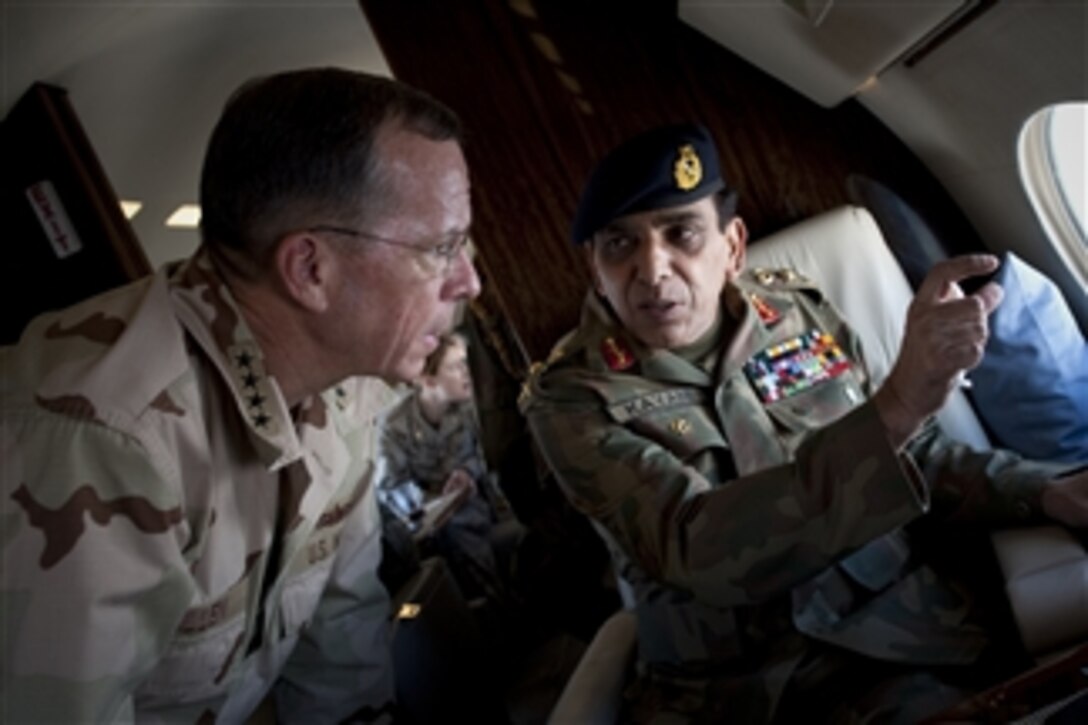 Pakistani Chief of Army Staff Gen. Ashfaq Parvez Kayani points out a feature to Chairman of the Joint Chiefs of Staff Adm. Mike Mullen, U.S. Navy, during an aerial tour of Northern Pakistan on July 24, 2010.  Mullen stopped in Pakistan during his 10-day, around the world tour to meet with counterparts and underscoring the criticality of the relationship in the war on terrorism.  