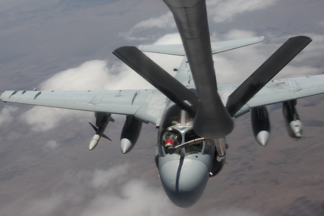 An EA-6B Prowler refuels off the boom of a U.S. Air Force KC-135R Tanker at an approximate height of 20,000 feet in the Nevada skies, July 27. The Prowler is from Marine Tactical Electronic Warfare Squadron 3, out of Marine Corps Air Station Cherry Point, N.C., and the Tanker is from the 22nd Air Refueling Wing, out of McConnell Air Force Base, Kan. Both aircraft are participating in Red Flag 10-4, which is a two-week advanced aerial combat training exercise, hosted at Nellis Air Force Base, Nev.