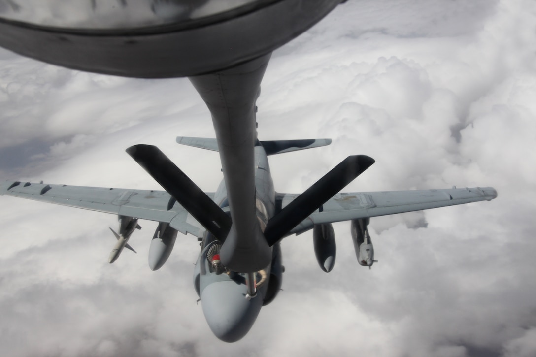An EA-6B Prowler refuels off the boom of a U.S. Air Force KC-135R Tanker at an approximate height of 20,000 feet in Nevada skies July 27. The Prowler is from Marine Tactical Electronic Warfare Squadron 3, stationed out of Marine Corps Air Station Cherry Point, N.C., and the Tanker is from the 22nd Air Refueling Wing, stationed out of McConnell Air Force Base, Kan. Both aircraft are participating in Red Flag 10-4, which is a two-week advanced aerial combat training exercise, hosted at Nellis Air Force Base, Nev.