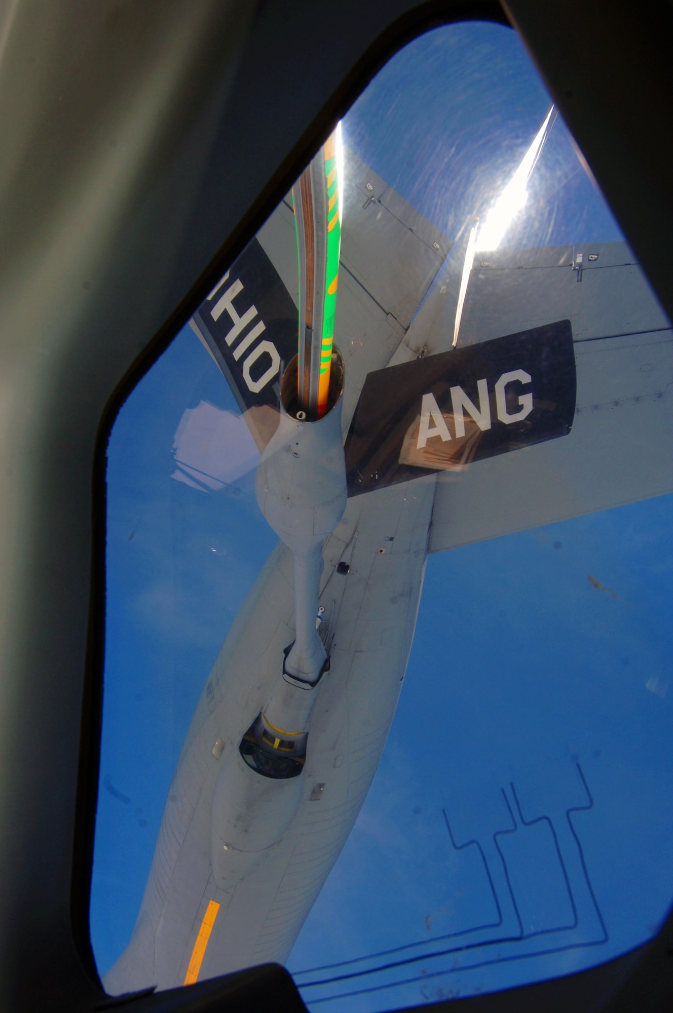 A KC-135 from the Ohio Air National Guard makes its approach to refuel a C-17 over the Pacific Ocean July 23. The sortie the C-17flew included a simulated cargo drop, in-flight refueling, and participation in a simulated fire fight as part of a Rim of the Pacific exercise. (U.S. Air Force photo by Staff Sgt. Nathan Allen)