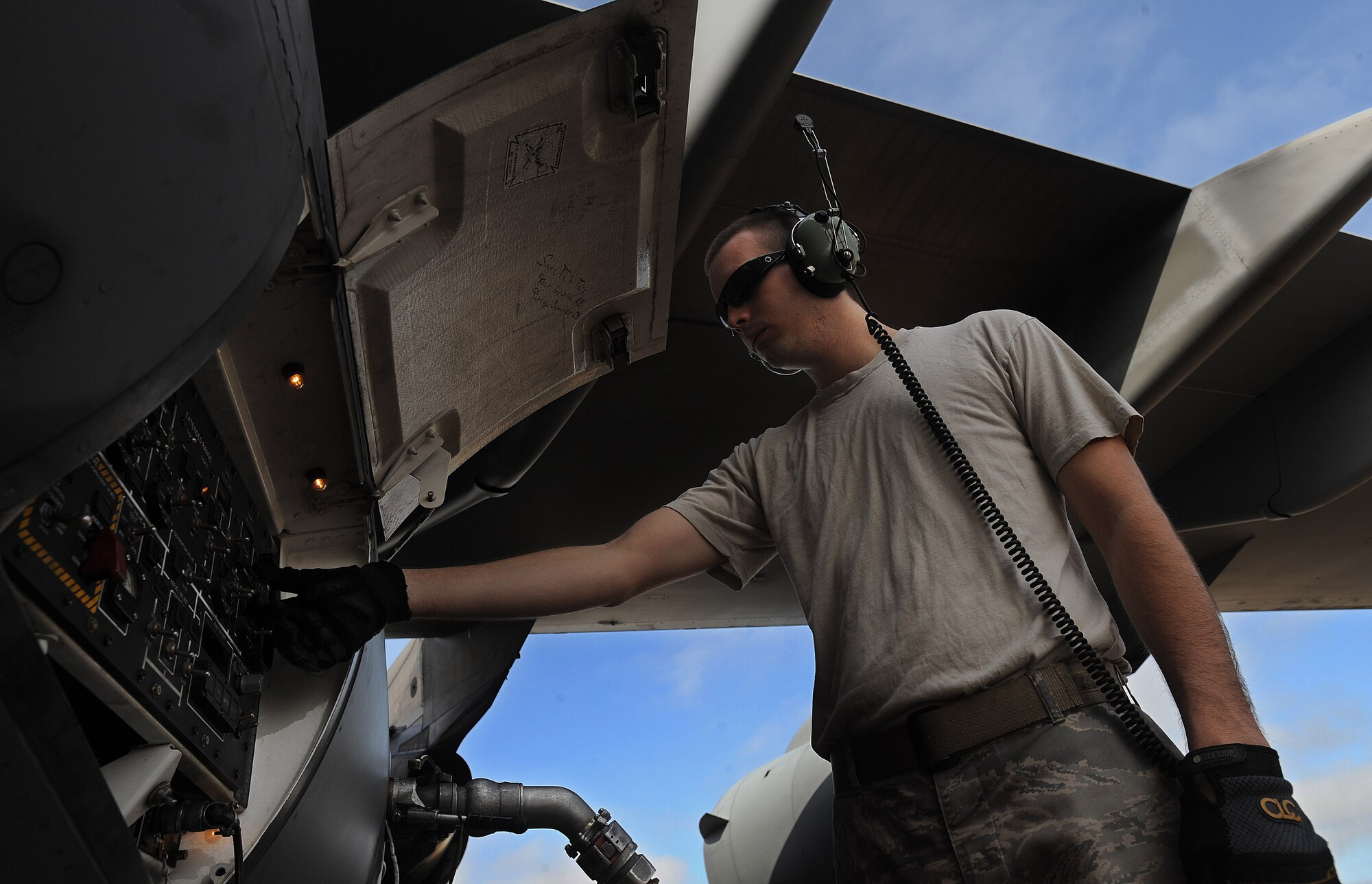 Staff Sgt Brandon Becker, a crew chief from 452nd MXS, refuels a C-17 Globemaster III aircraft at Naval Air Station North Island, Calif., during the weekly Integrated Continental United States Medical Operations Plan mission or ICMOP mission as it's known by it's acronym. The mission picks up war wounded and other patients at Andrews Air Force Base, Calif., and returns them to their homes throughout the United States.   (U.S. Air Force photo by Master Sgt. Rick Sforza)
