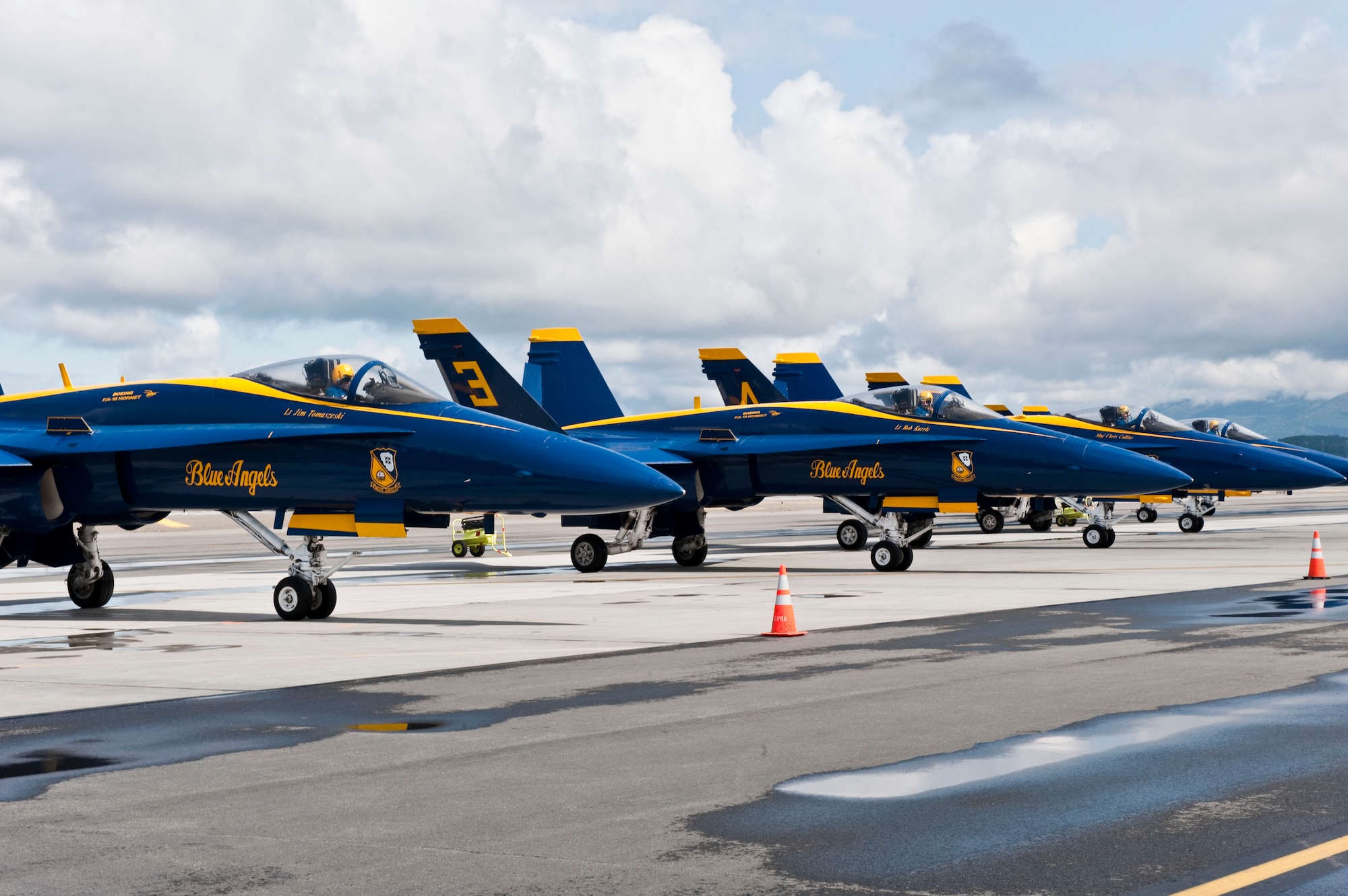 JOINT BASE ELMENDORF RICHARDSON, Alaska -- U.S. Navy Blue Angels pilots prepare to exit their aircraft after arriving at Joint Base Elmendorf-Richardson July 27. The Blue Angels will be one of the main performances during this year?s Arctic Thunder Air Show, taking place July 31 and Aug. 1. Gates open at 9 a.m. and parking and admission are free. (Air Force photo by Airman 1st Class Jack Sanders)