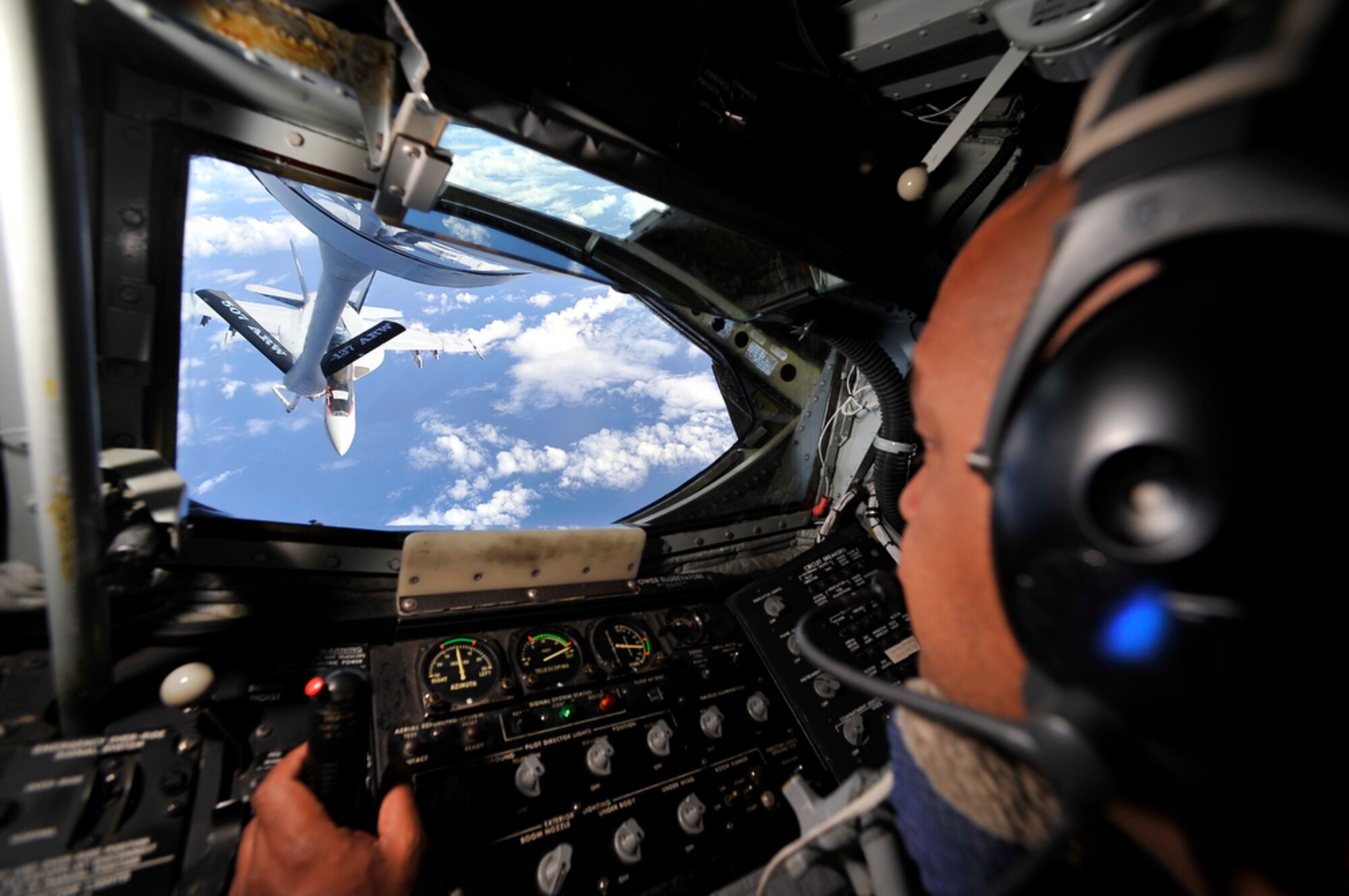 A  KC-135 Stratotanker assigned to the 507th Air Refueling Squadron, Tinker Air Force Base, Okla., refuels a U. S. Navy F/A-18 Super Hornet over Hawaiian air space during the Rim of the Pacific exercise on July 20, 2010. RIMPAC, the world's largest maritime exercise, is a biennial event which stresses interoperability of all partner nations as a key element of regional stability. There are 14 nations, 32 ships, five submarines, more than 170 aircraft and 20,000 personnel involved in RIMPAC.   (U.S.  Air Force photo/Tech Sgt. Cohen A. Young)