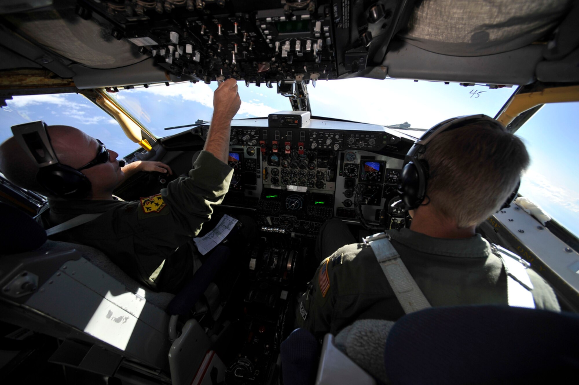 JOINT BASE PEARL HARBOR-HICKAM, Hawaii - A  KC-135 Stratotanker assigned to the 507th Air Refueling Squadron, Tinker Air Force Base, Okla. refuels U. S. Navy F/A-18 Super Hornet and EA-6 Prowler aircraft over Hawaiian air space during the Rim of the Pacific Exercise on July 20. RIMPAC, the world's largest maritime exercise is a biennial event which stresses interoperability of all partner nations as a key element of regional stability. There are 14 nations, 32 ships, five submarines, more than 170 aircraft and 20,000 personnel involved here in this exercise.   (U.S.  Air Force photo/Tech Sgt. Cohen A. Young)
