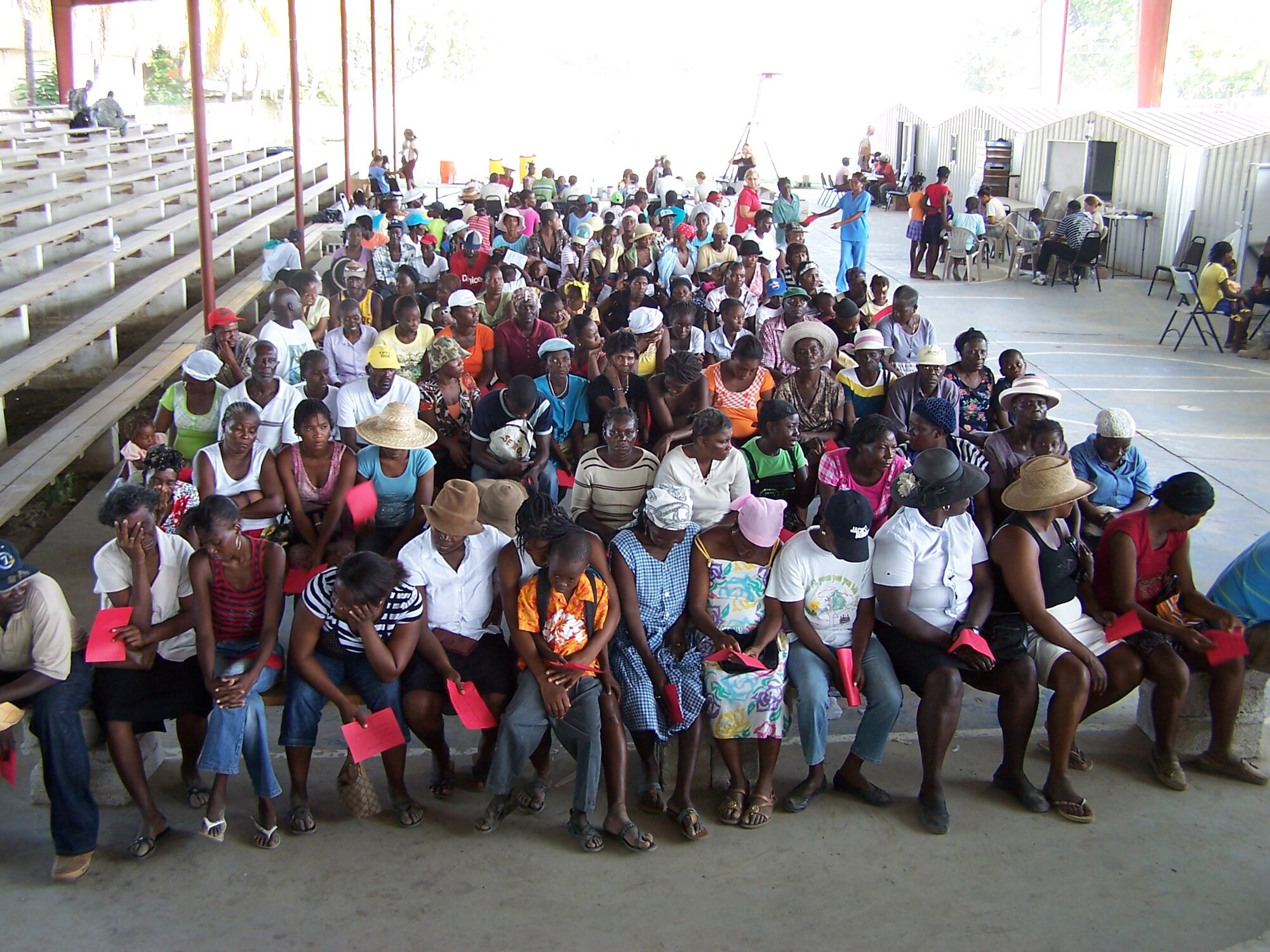 Patients wait to be seen at the medical outreach setup by the 20th Medical Group.  The 20th MDG were the first team to arrive in Haiti to support the New Horizons Haiti mission. The 20th MDG Airmen set up a medical outreach at Saint-Marc, Haiti, about 60 miles north of Port-au-Prince during the two and a half week deployment. (Courtesy photo)