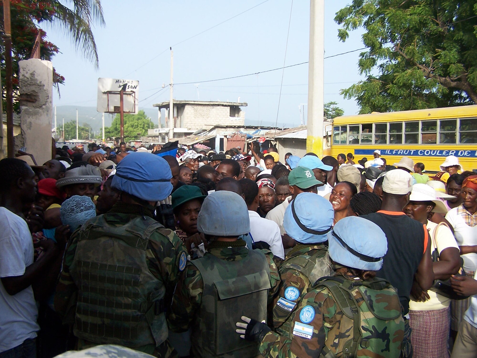 Haitian patients wait to be seen in the morning outside the compound gate.  The 20th Medical Group were the first team to arrive in Haiti to support the New Horizons Haiti mission. The 20th MDG Airmen set up a medical outreach at Saint-Marc, Haiti, about 60 miles north of Port-au-Prince during the two and a half week deployment. (Courtesy photo)