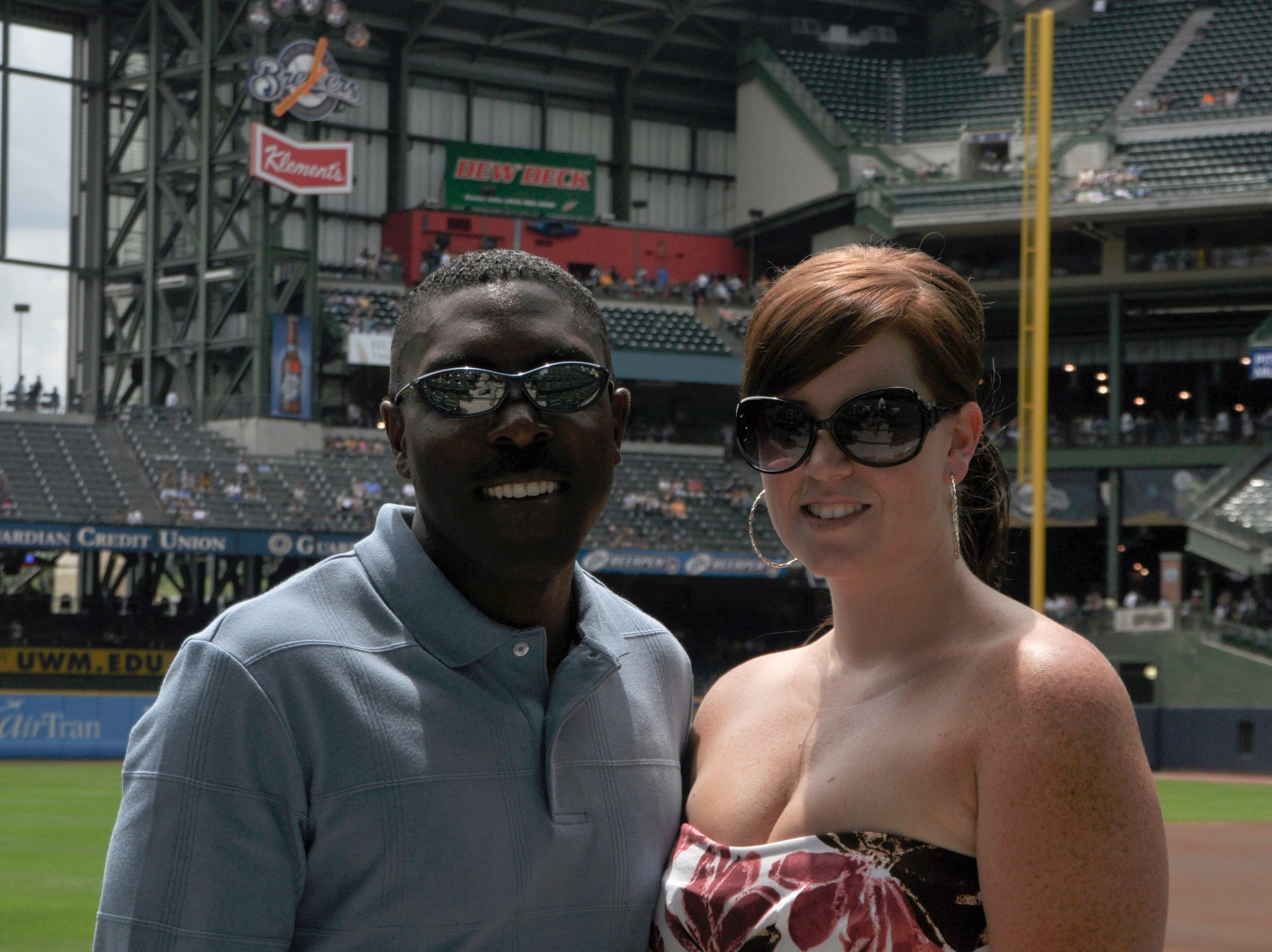 Senior Master Sgt. Marlin Mosley, an instructor boom operator for the 128th Air Refueling Wing, Milwaukee, and his wife, Jessica Mosley, stand near the ball field at Miller Park, Milwaukee, on Sunday, July 11, 2010. Sergeant Mosley was recognized during the pre-game of the Brewers' Sunday match for his continuing service to the nation and for his excellent performance during recent deployments. 
