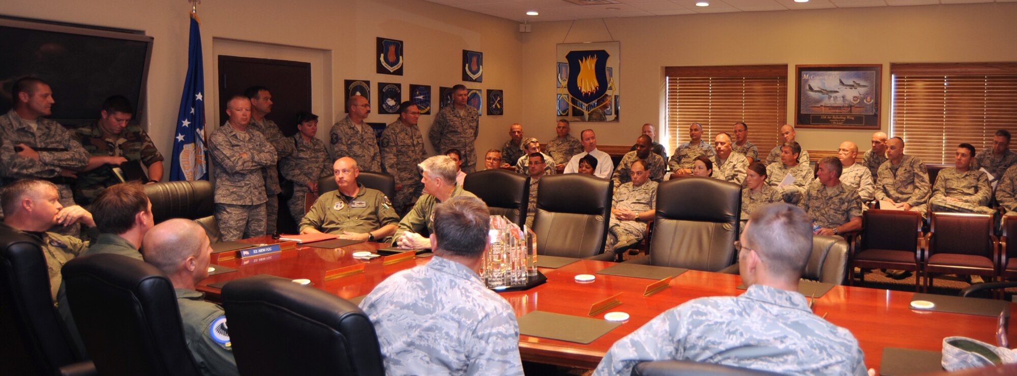 Airmen from the 185th Air Refueling Wing, Iowa Air National Guard, meet with Airmen from the 22nd Air Refueling Wing, July 21, 2010, McConnell Air Force Base, Kan.  Thirty-one Airmen from organizations in the 185th ARW visited McConnell in preparation for an upcoming 2011 Operational Readiness Inspection where both wings will be assessed concurrently.  The 185th ARW interacted with their organizational counterparts from McConnell for an un-official work area familiarization and to initiate communication between the inspection points of contact.  (U.S. Air Force photo/Senior Airman Maria Ruiz)