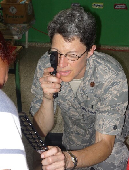 Maj. Stephanie Holt, an optometrist with the 512th Aerospace Medicine Squadron at Dover Air Force Base, Del., performs an eye exam on a patient in the Dominican Republic. Thirty-nine Air Force Reserve medics with the 512th AMDS treated more than 8,000 patients during MEDRETE 2010 Dominican Republic July 10-24. The 512th Airlift Wing Airmen worked with a team of doctors from the Dominican military to provide free medical care to the citizens of Constanza during the two-week medical training exericse. (U.S. Air Force photo/Tech. Sgt. Jennifer Hinshaw)