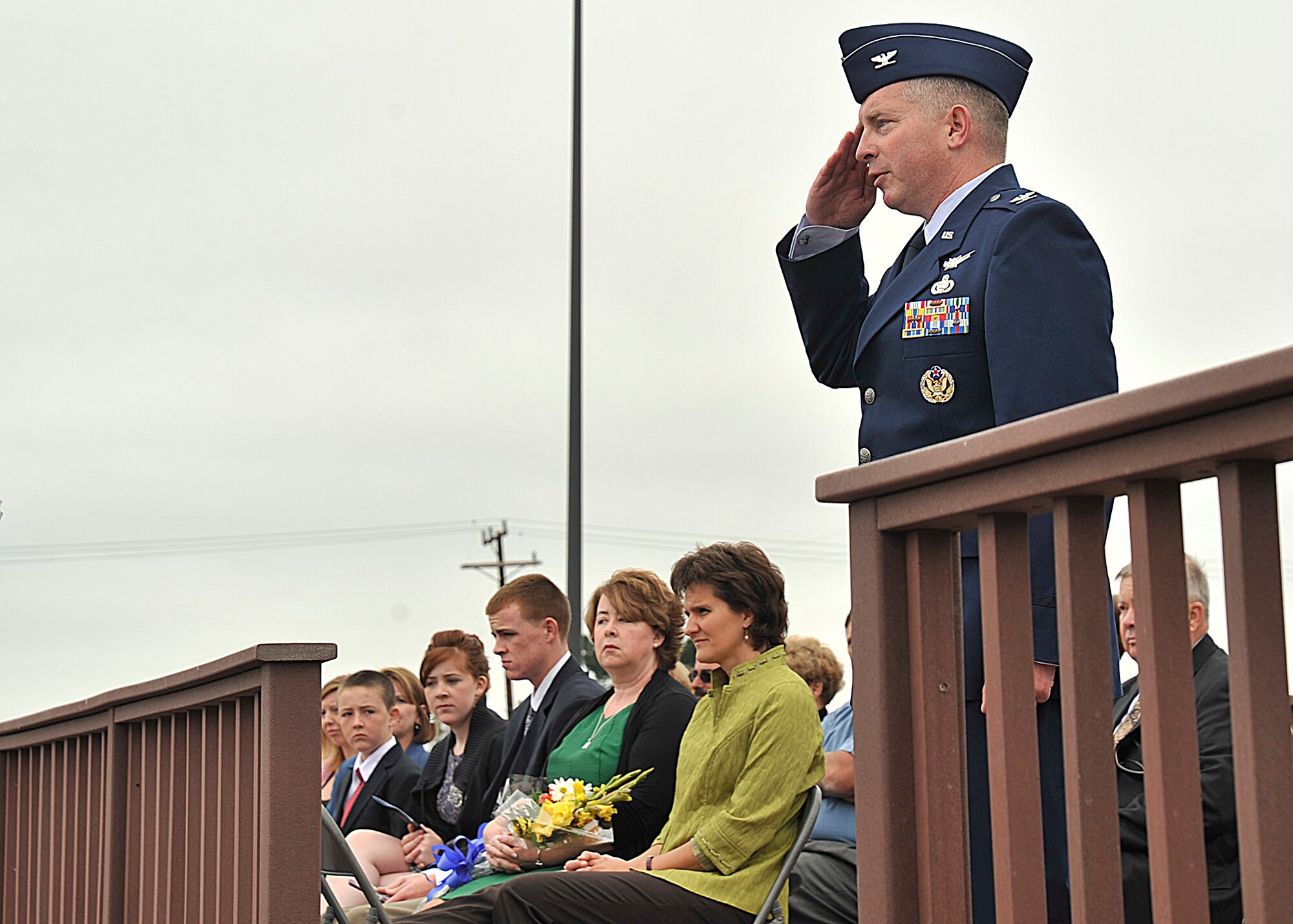 VANDNEBERG AIR FORCE BASE, Calif.--Col Kelly Kirts, the 30th Mission Support Group commander, renders a salute to the five squadrons in his command during the change of command ceremony here Monday, July 26, 2010. Colonel Kirts will  command 26 30th Space Wing organizations, 18 associate units, 45 contractors and more than 10,000 people. (U.S. Air Force Photo/Senior Airman Stephanie Longoria)