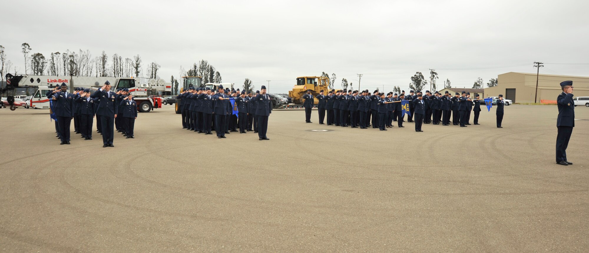 VANDNEBERG AIR FORCE BASE, Calif.-- Members of the 30th Mission Support  Group honor their new commander, Col. Kelly Kirts, with a salute during the change of command ceremony here Monday, July 26, 2010. Colonel Kirts will  command 26 30th Space Wing organizations, 18 associate units, 45 contractors and more than 10,000 people. (U.S. Air Force Photo/Senior Airman Stephanie Longoria)