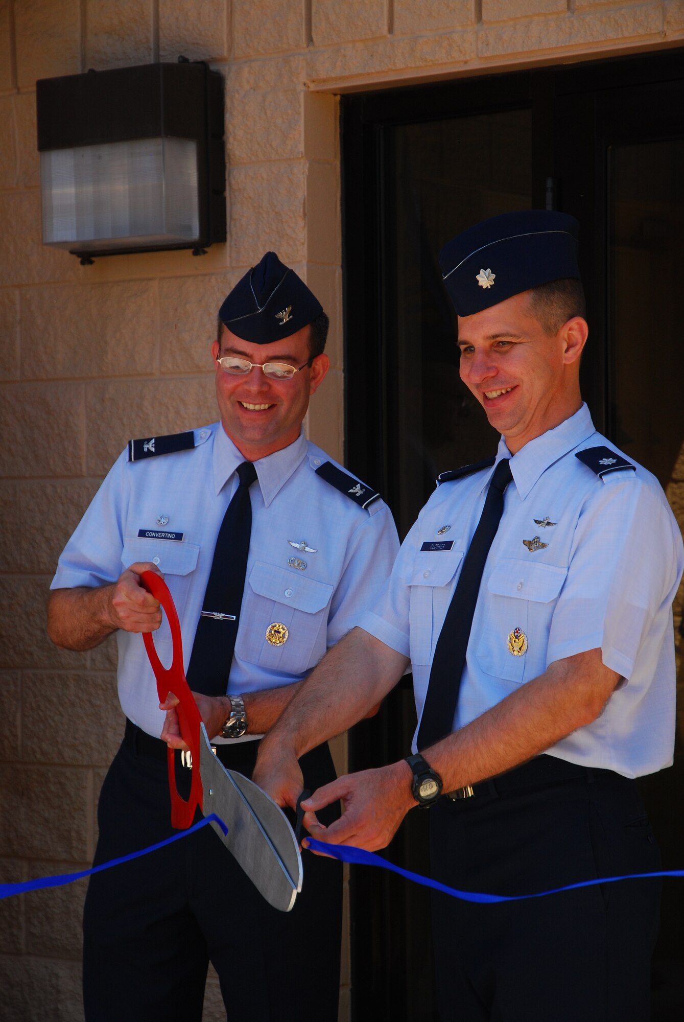 Col. Michael Convertino, 318th Information Operations Group
commander, and Lt. Col. Dean Clothier, 39th Information Operations Squadron
commander, cut the ribbon during a ceremony celebrating the completion of
the 4,500 sq. ft. facility addition to the 39 IOS information operations and
cyber schoolhouse.   The new state-of-the-art facility will facilitate
training future cyber warriors in multiple network warfare, electronic
warfare and influence operations related courses.(U.S. Air Force photo)
