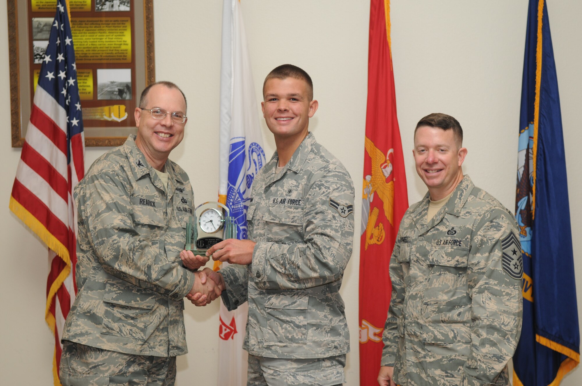 GOODFELLOW AIR FORCE BASE, Texas -- Airman 1st Class Grant Homan, 17th Medical Group, receives 17th Training Wing Dorm Room of the Quarter during the wing quarterly awards ceremony July 27. (U.S. Air Force photo/Airman 1st Class Clayton Lenhardt) 