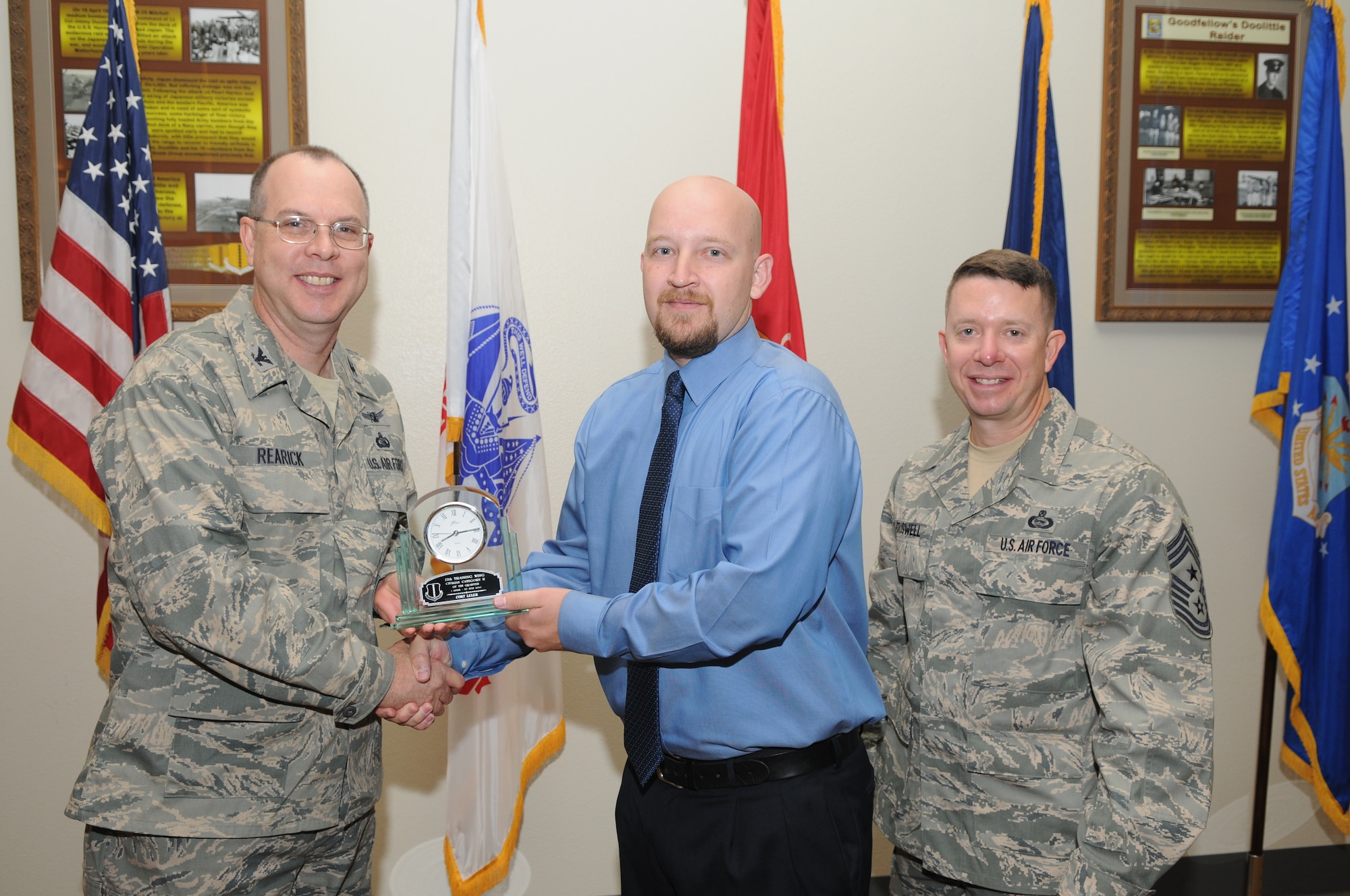 GOODFELLOW AIR FORCE BASE, Texas -- Cory Lelek, 17th Training Wing staff, receives 17th Training Wing Civilian of the Quarter Category 2 during the wing quarterly awards ceremony July 27. (U.S. Air Force photo/Airman 1st Class Clayton Lenhardt) 