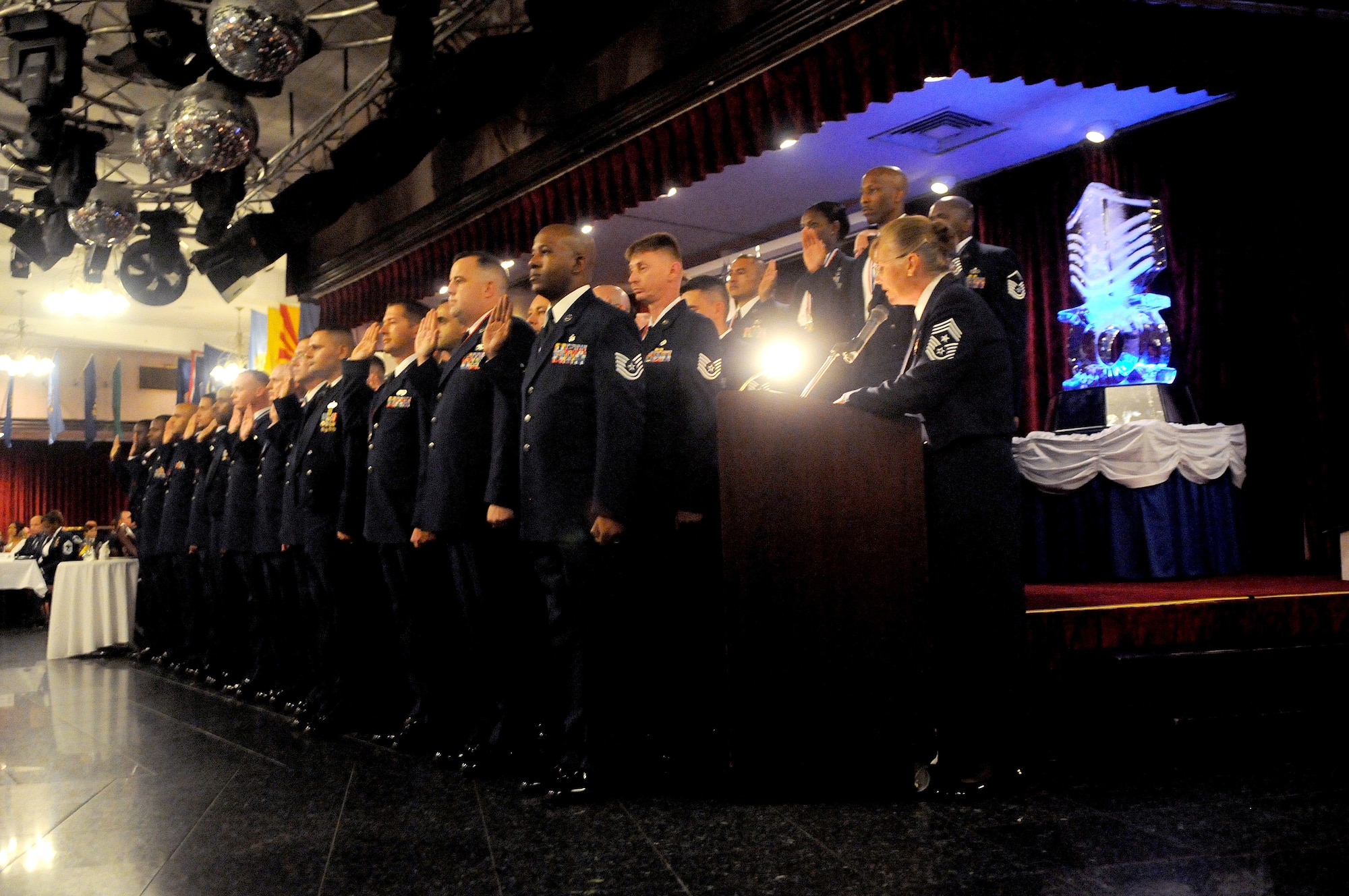 Team members from Kadena Air Base are sworn into the Senior NCO corps at the Senior NCO Induction Ceremony at Kadena Air Base July 24.There were 81 team Kadena members inducted into the Senior NCO corps. (U.S. Air Force photo/ Staff Sgt. Jonathan Steffen)