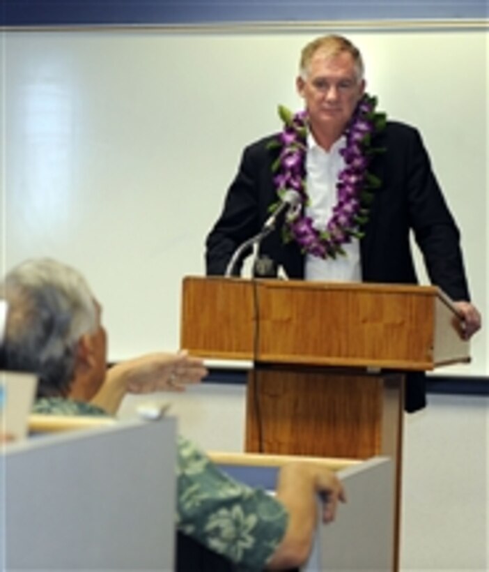 Deputy Secretary of Defense William J. Lynn III listens to a question from President of the University of Guam Robert Underwood during a recent Presidential Lecture series engagement at the university on July 27, 2010.  