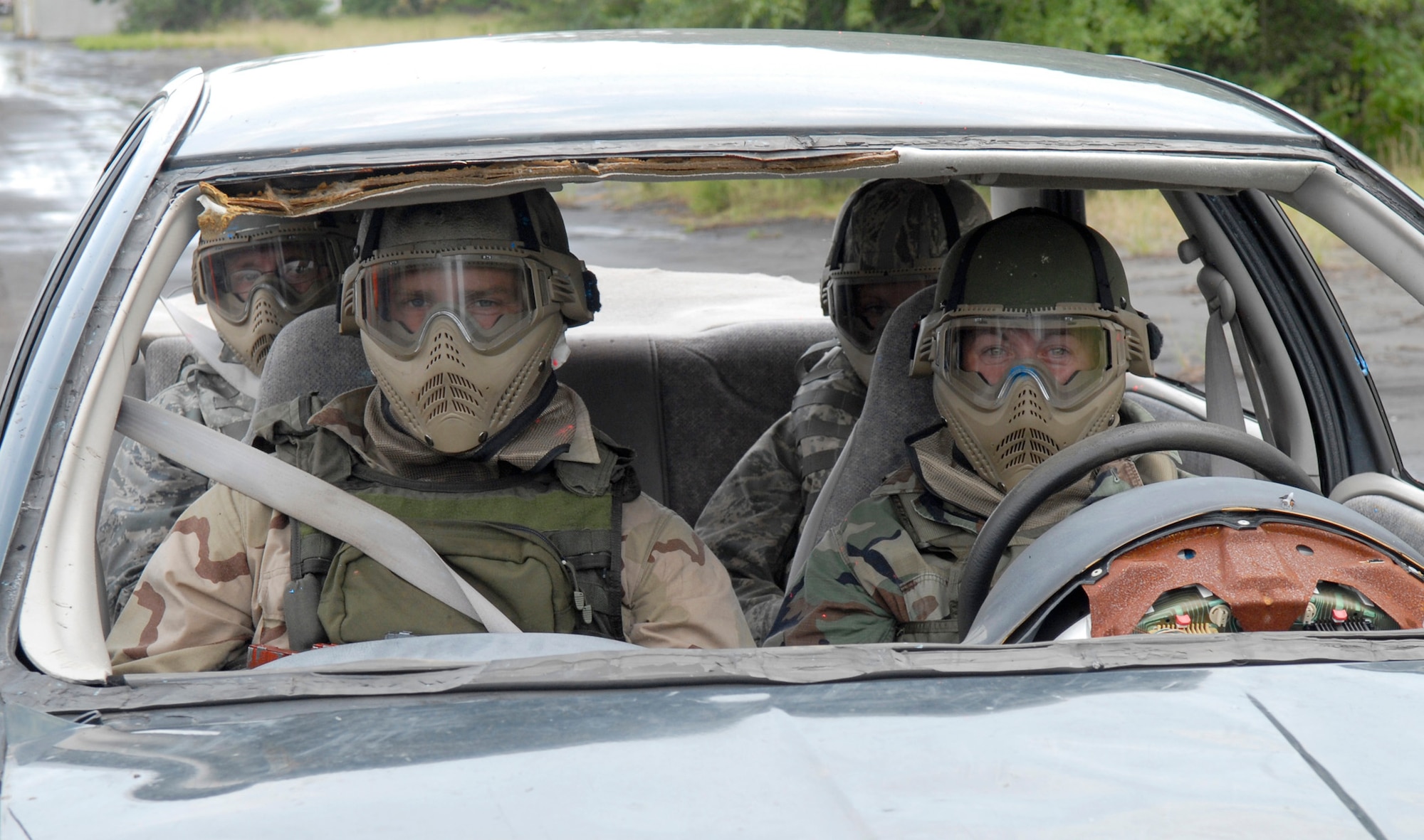 Students wait for their turn to master the defensive driving course July 23, 2010, at Eglin Range, Fla. (U.S. Air Force photo/Staff Sgt. Sarah Martinez)