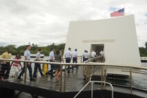 JOINT BASE PEARL HARBOR HICKAM, Hawaii - Air Force Academy cadets visit the Arizona Memorial during the Boathouse Tour as part of Operation Air Force here, July 15. The 15th Wing mission mentor program involved time spent with the 15th Medical Group, 15th Operations Group, 15th Maintenance Group, and 647th Air Base Group to gain an appreciation for the team effort required to accomplish the 15th WG mission. Additionally, the cadets took special tours of the 613th Air and Space Operations Center and Arizona Memorial, and were included in senior officer visits. (U.S. Air Force photo/Senior Airman Gustavo Gonzalez)