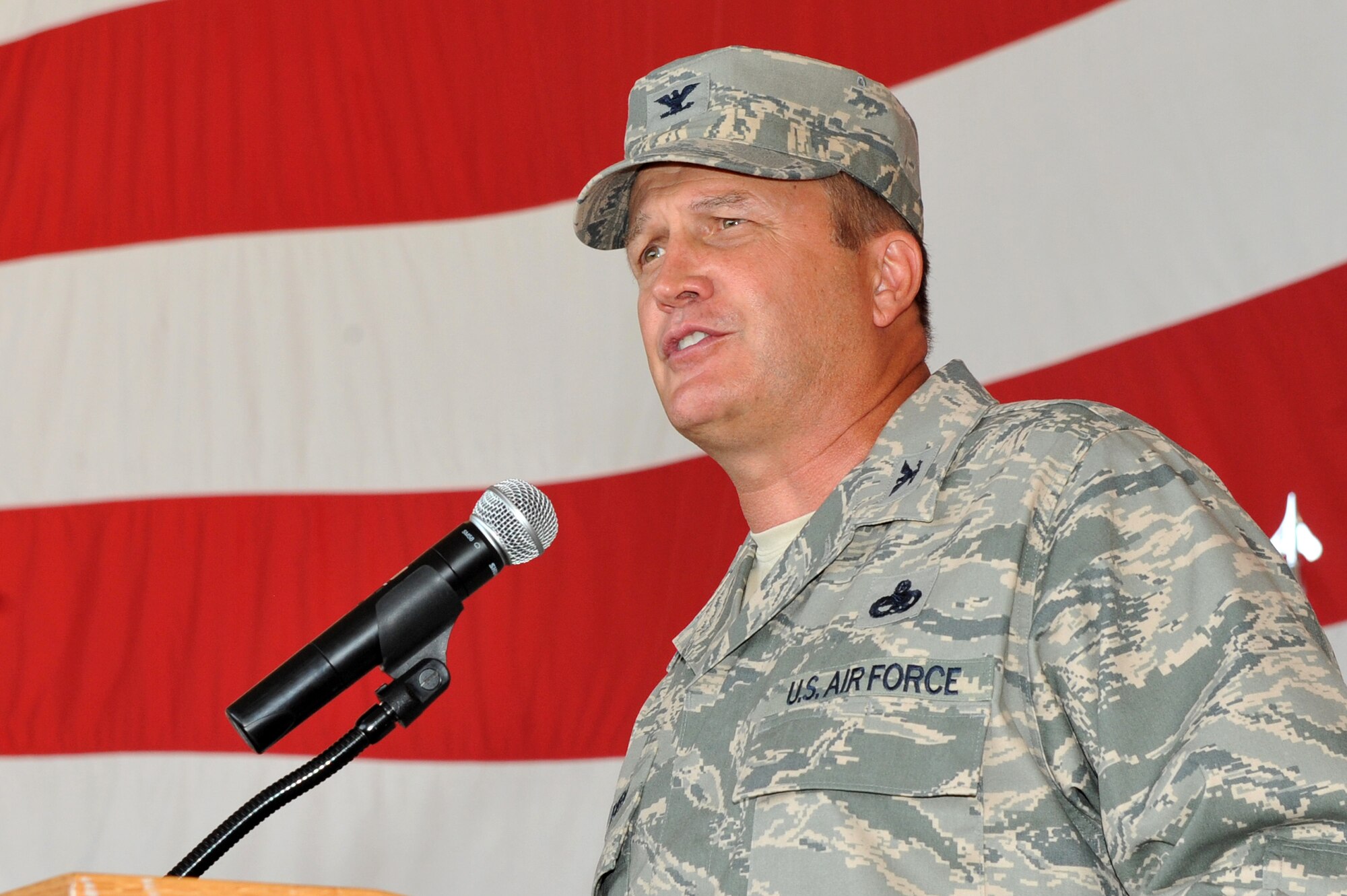 Col. George Pierce, 19th Maintenance Group commander, shares goals as well as thanks with those in attendance at the 19th MXG change of command ceremony July 23 on base. The 19th MXG supports maintenance to 52 19th Airlift Wing C-130s, 36 314th Airlift Wing C-130s and five ground training support aircraft.  (U.S. Air Force photo by Senior Airman Steele C. G. Britton)