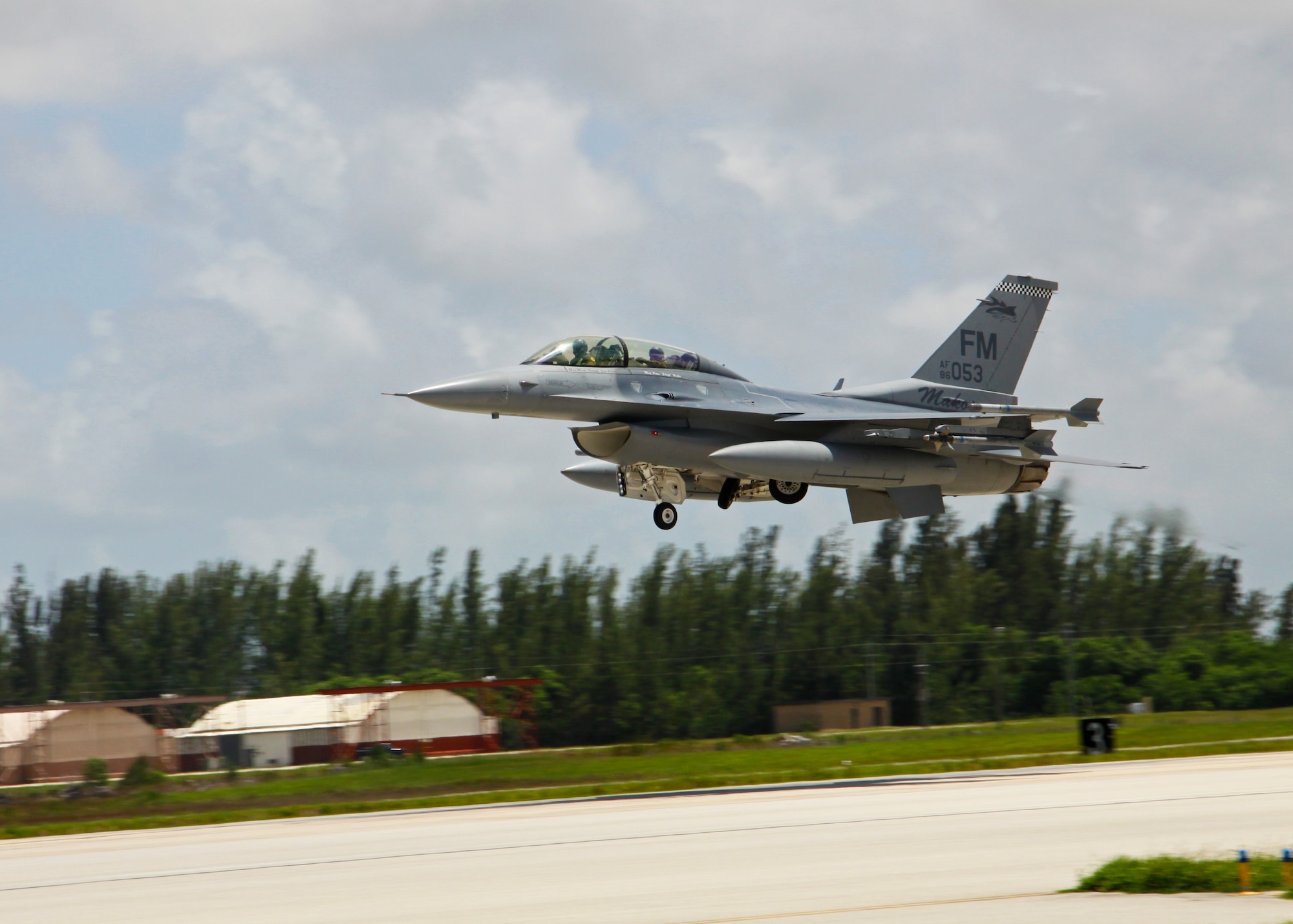 An F-16D of the 93rd Fighter Squadron, 482nd Fighter Wing, takes to the air carrying Col. Jose Monteagudo, 482nd FW Vice Commander, and Uruguayan Air Force Capt. Patrick Jaimez, 2nd Air Brigade. Capt. Jaimez flew with the "Makos" as part of a subject matter expert exchange flight, July 26, 2010, at Homestead Air Reserve Base, Fla. (U.S. Air Force photo/Ian Carrier)