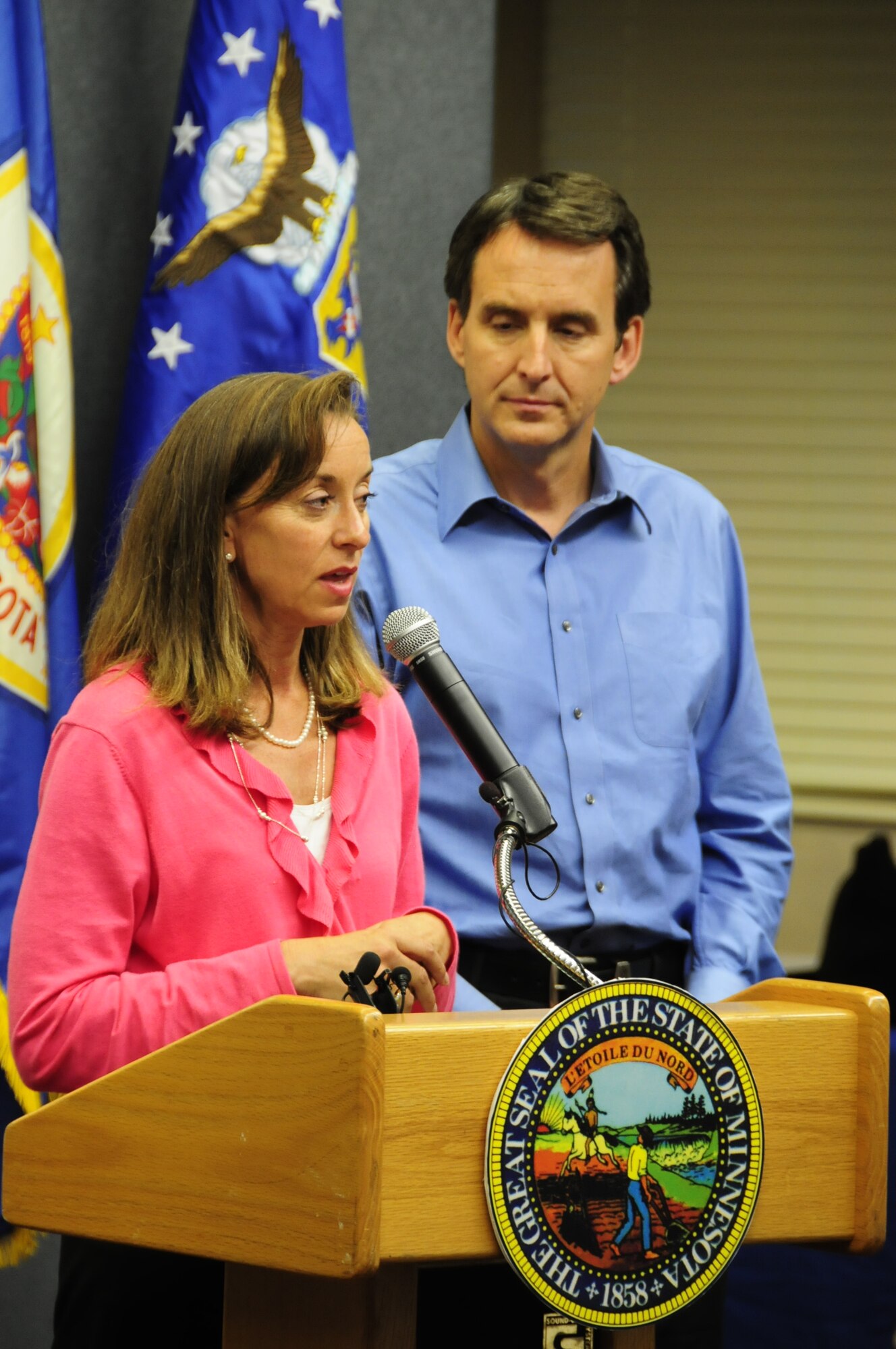 Minnesota Governor Tim Pawlenty and First Lady Mary Pawlenty speak to military members, family and community leaders at the 148th Fighter Wing Air National Guard Base in Duluth, Minn. July 28, 2010. Governor Pawlenty and the First Lady arrived at the 148th to announce that the First Lady’s Military Family Care Initiative will continue and expand to provide additional assistance to military families under the National Guard’s Beyond the Yellow Ribbon Program. (Air National Guard photo by Tech. Sgt. Amie M. Dahl)           