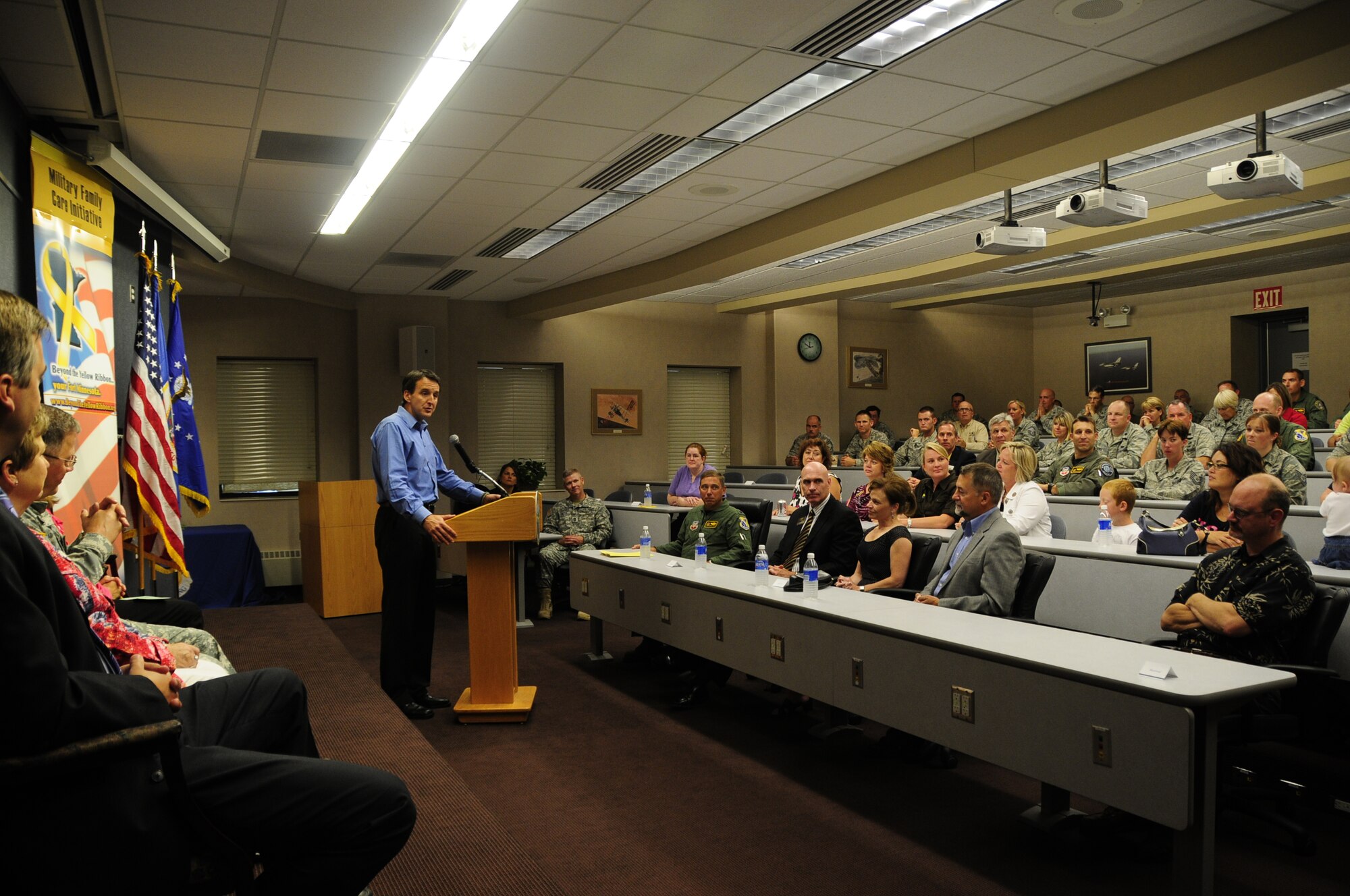 Minnesota Governor Tim Pawlenty speaks to military members, family and community leaders at the 148th Fighter Wing Air National Guard Base in Duluth, Minn. July 28, 2010. Governor Pawlenty and the First Lady arrived at the 148th to announce that the First Lady’s Military Family Care Initiative will continue and expand to provide additional assistance to military families under the National Guard’s Beyond the Yellow Ribbon Program. (Air National Guard photo by Tech. Sgt. Amie M. Dahl)        