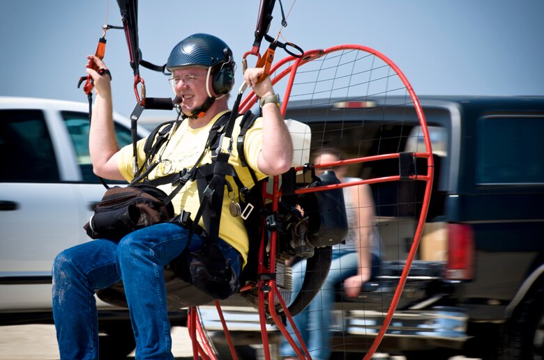 A Narrow Escape - Preparing to take off in his powered paraglider, Beery Miller says he learned some important lessons after participating in the harrowing water rescue of a powered parachutist who crashed his craft and was trapped under water in the Gulf of Mexico. (photo by Tech. Sgt. Samuel Bendet)