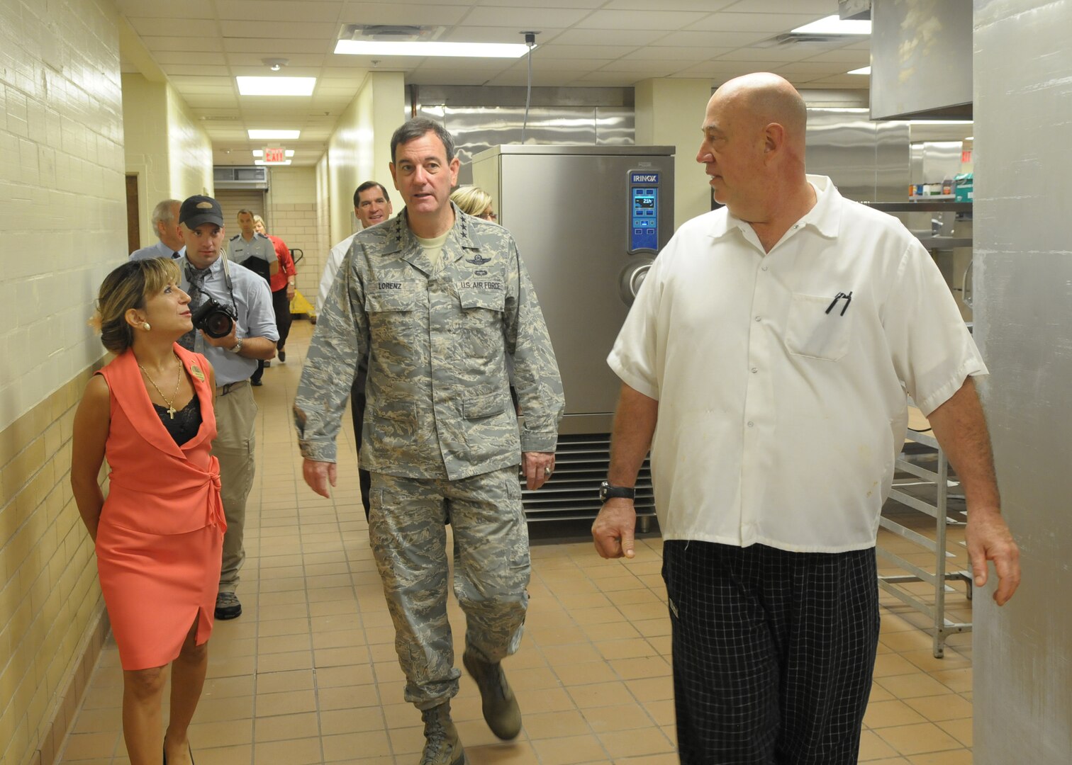 Gen. Stephen Lorenz, Air Education and Training Command commander, tours the Parr Club's renovated kitchen.  Merilyn Gove, club manager, and Michael Young, Certified Executive Chef, show General Lorenz all the upgrades. The kitchen has been through several months of renovation. (U.S. Air Force photo by Joel Martinez)