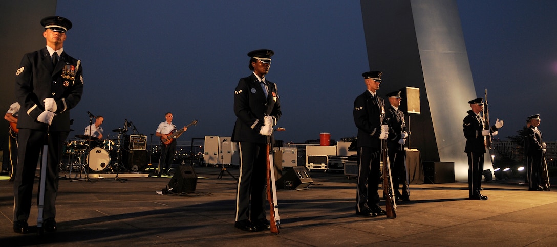 The integrated music and drill performance team, Air Strike, performs July 21 at the Air Force Memorial in Washington. The event also featured performances by the U.S. Air Force rock band Max Impact and the U.S. Air Force Honor Guard Drill Team. The Band’s six performing ensembles take turns performing throughout the summer at the Air Force Memorial each Wednesday and Friday with no fee for attendance. The ensembles also take turns performing every Tuesday on the steps of the Capitol Building. For more information, please visit www.usafband.af.mil. (U.S. Air Force photo by Senior Airman Jaclyn McDonald)