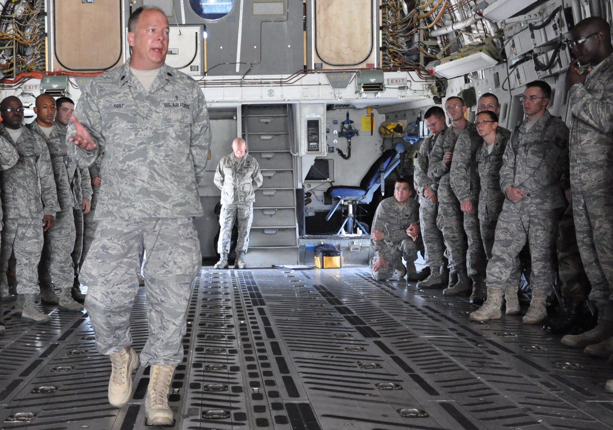 Chaplain (Lt. Col.) Carl Yost gives an overview of casualty ramp ceremony training to 30 chaplain candidates here July 27. Chaplain Yost is a 315th Airlift Wing chaplain, and the chaplain candidates are with the  Air Force Chaplain Candidate Intensive Internship Program. (U.S. Air Force photo/Staff Sgt. Shane Ellis)