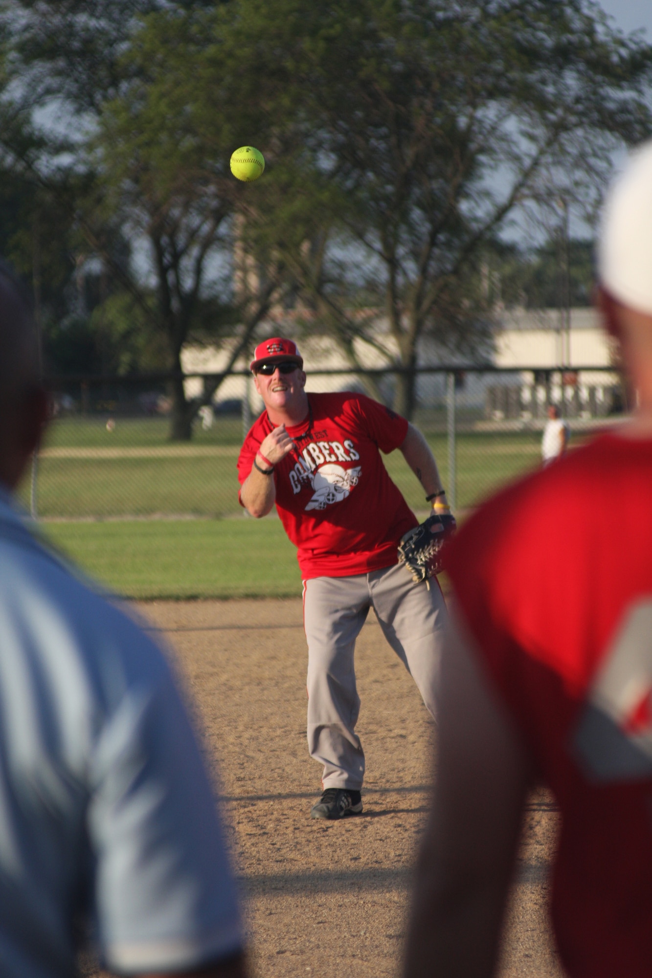 WRIGHT-PATTERSON AIR FORCE BASE, Ohio – Tech. Sgt. Brian Knouse, 445th Operations Support Squadron, delivers a pitch during the Third Annual Air Force Sergeants Association Active Duty vs. Reserves Softball Challenge July 24.  (U.S. Air Force photo/Senior Airman Robert Nelson)