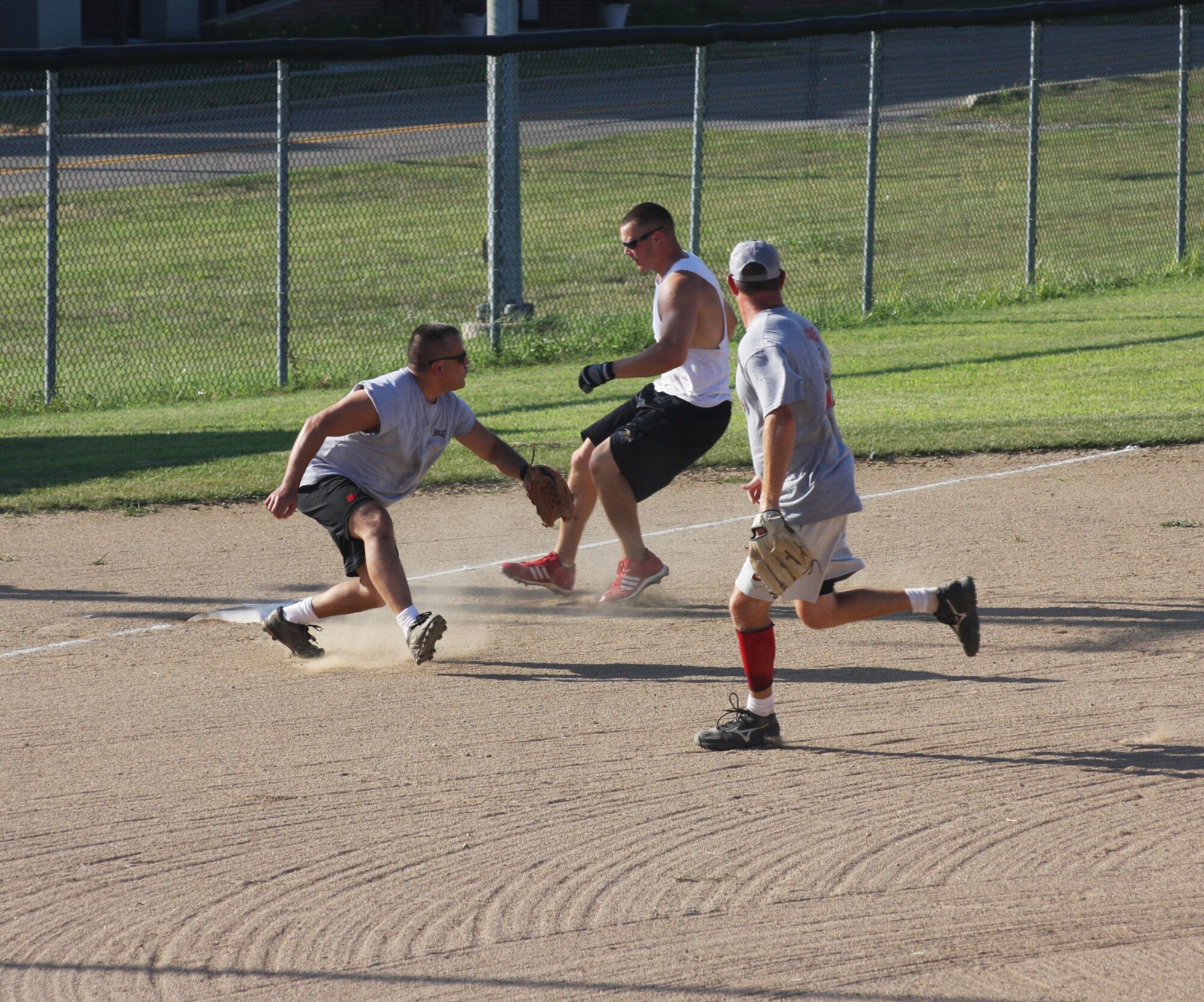 WRIGHT-PATTERSON AIR FORCE BASE, Ohio – Maj. John Marang, 87th Aerial Port Squadron, attempts to tag out the runner during the Third Annual Air Force Sergeants Association Active Duty vs. Reserves Softball Challenge July 24. (U.S. Air Force photo/Senior Airman Robert Nelson)