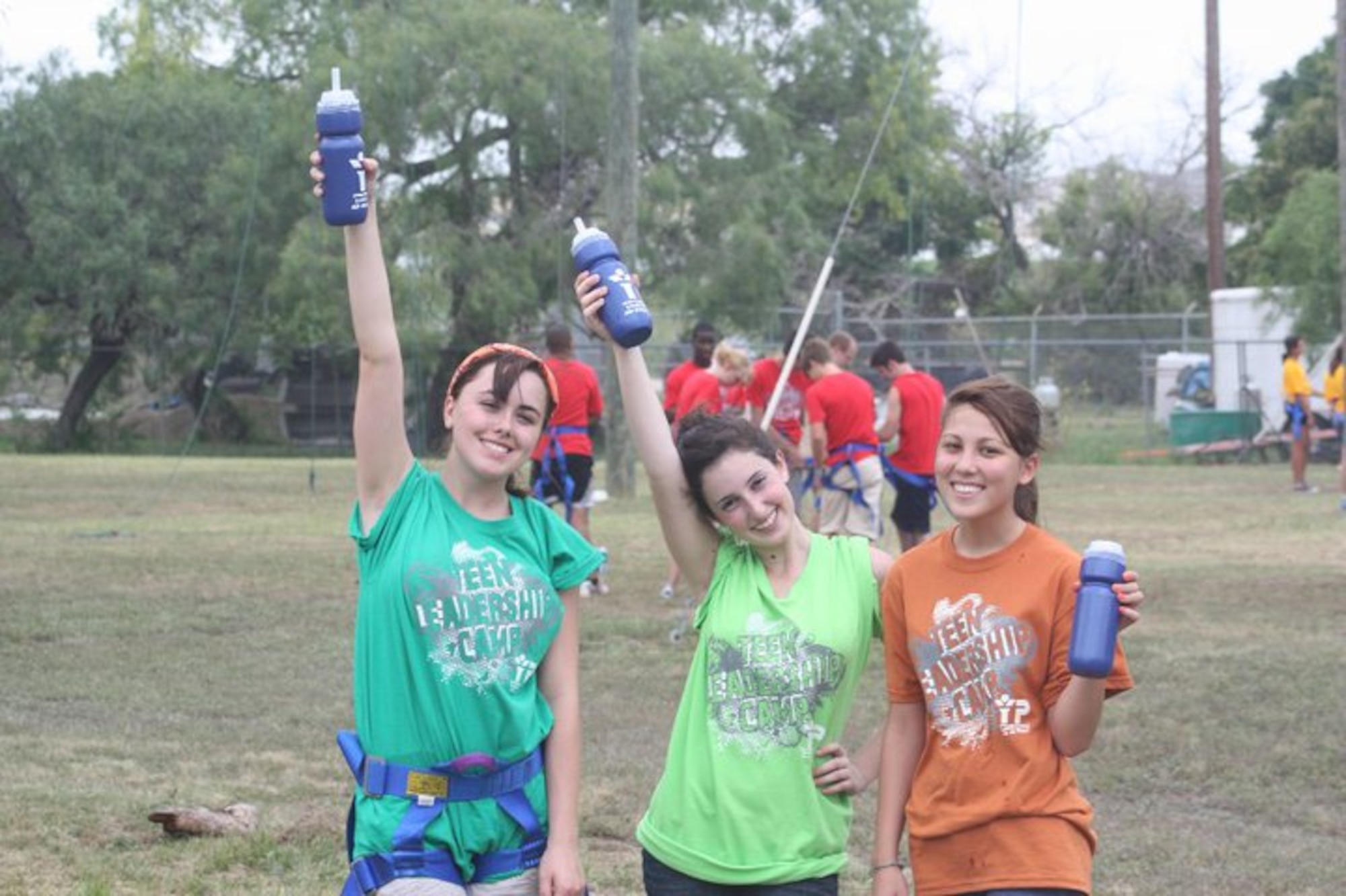 Local Desert high school students (from left) Raven Summers, 17; Sarah Chahine, 14; and Kasey Kalita, take time out from participating in camp exercises to pose for a picture together. The three local high school students were among 66 other high school students chosen from high schools across the country to participate in an Air Force-sponsored 5-day Teen Leadership Camp held in San Antonio, Texas. (Air Force photo by Paul Labella)