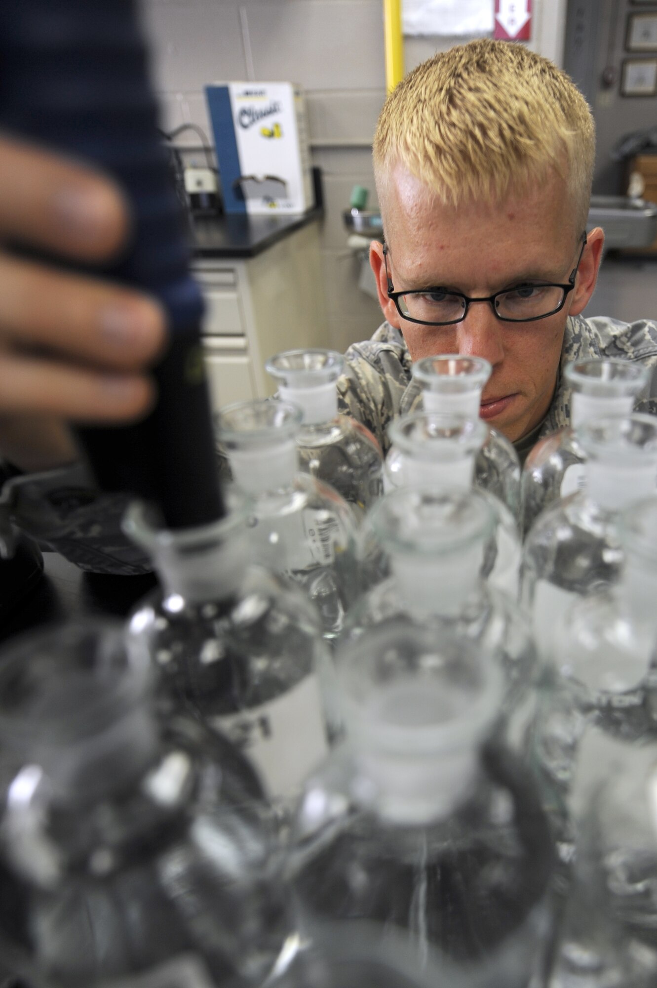 WHITEMAN AIR FORCE BASE, Mo. - Staff Sgt. Joseph Estridge, 509th Civil Engineer Squadron, measures the oxygen levels of samples taken from around the plant.(U.S. Air Force photo by Senior Airman Carlin Leslie)(released)
