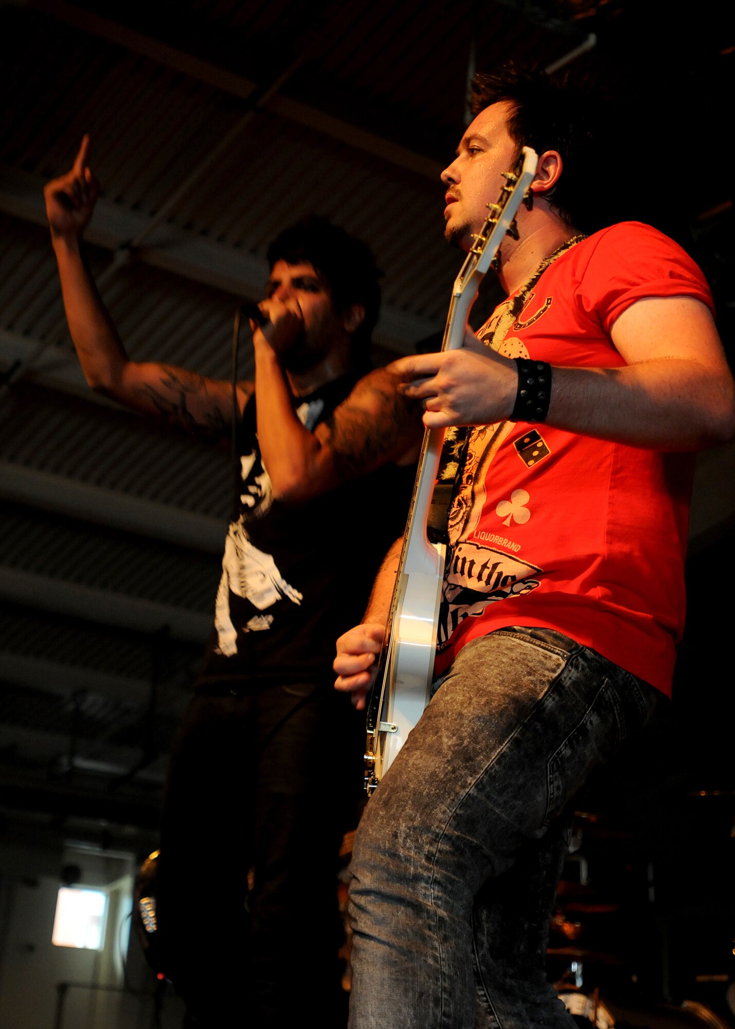 The rock group Dear Superstar performs the opening act for the rock band Papa Roach at the Personnel Alert Holding Area July 25.  Papa Roach and Dear Superstar performed for Aviano Airmen and their families as part of a United Service Organization-sponsored show.  (U.S. Air Force photo/Senior Airman Tabitha M. Lee)