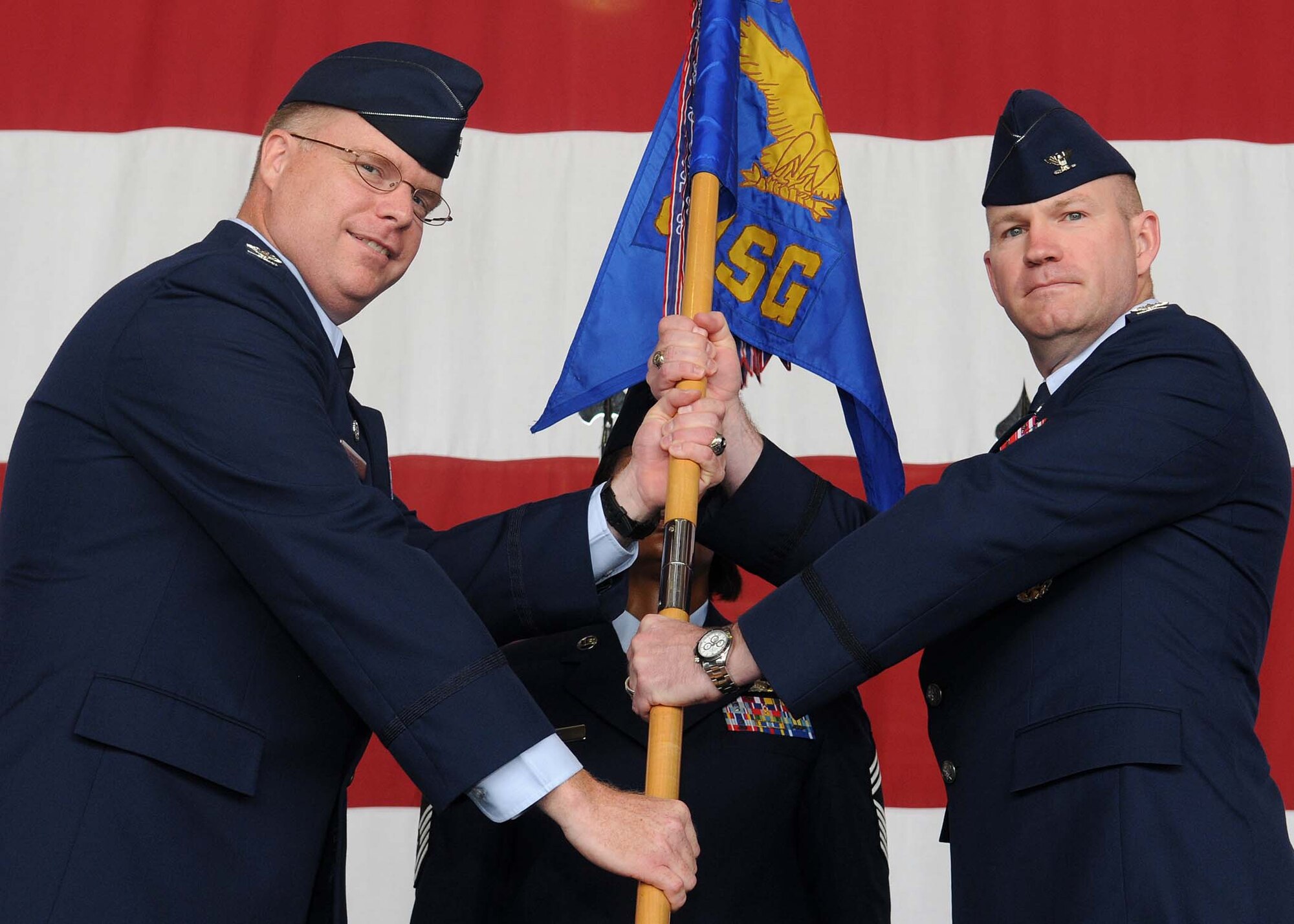 Col. Scott Enold (right) accepts command of the 39th Mission Support Group from Col. Eric Beene, 39th Air Base Wing commander, during the change of command ceremony July 28, 2010 at Incirlik Air Base, Turkey.  Prior to taking command of the 39th MSG, Colonel Enold was the Director, Force Protection, United States Air Force Central Command.  The change of command ceremony is an Air Force tradition that gives unit Airmen the opportunity to view their new leader take command.  (U.S. Air Force photo/Senior Airman Ashley Wood)