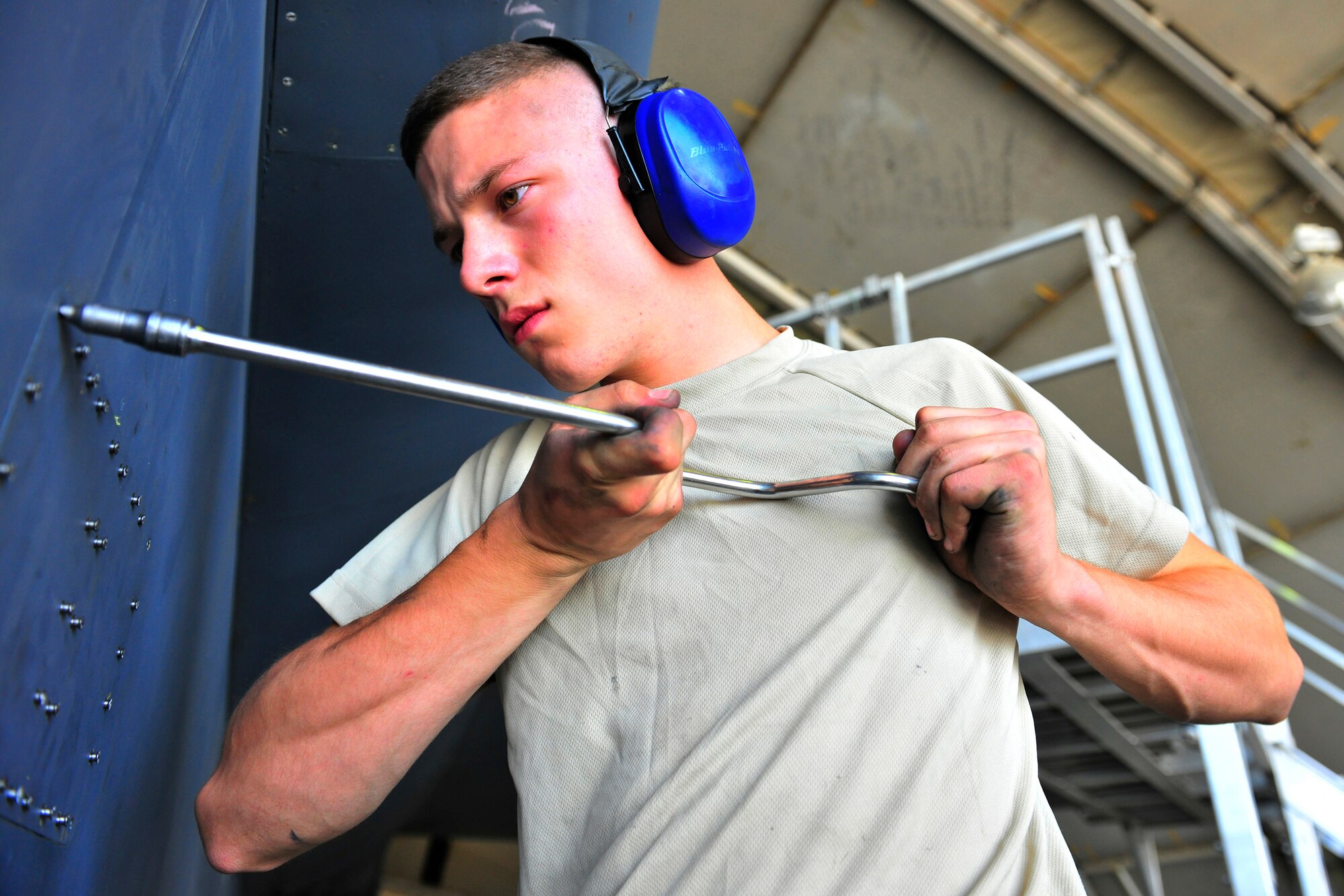 Airman 1st Class Tyler Laplante, an inspection section journeyman assigned to the 455th Expeditionary Maintenance Squadron, installs inlet ramp panels on an F-15E Strike Eagle at Bagram Airfield, Afghanistan, July 27, 2010. Airman Laplante is a member of the maintenance phase section. (U.S. Air Force photo/Staff Sgt. Christopher Boitz)