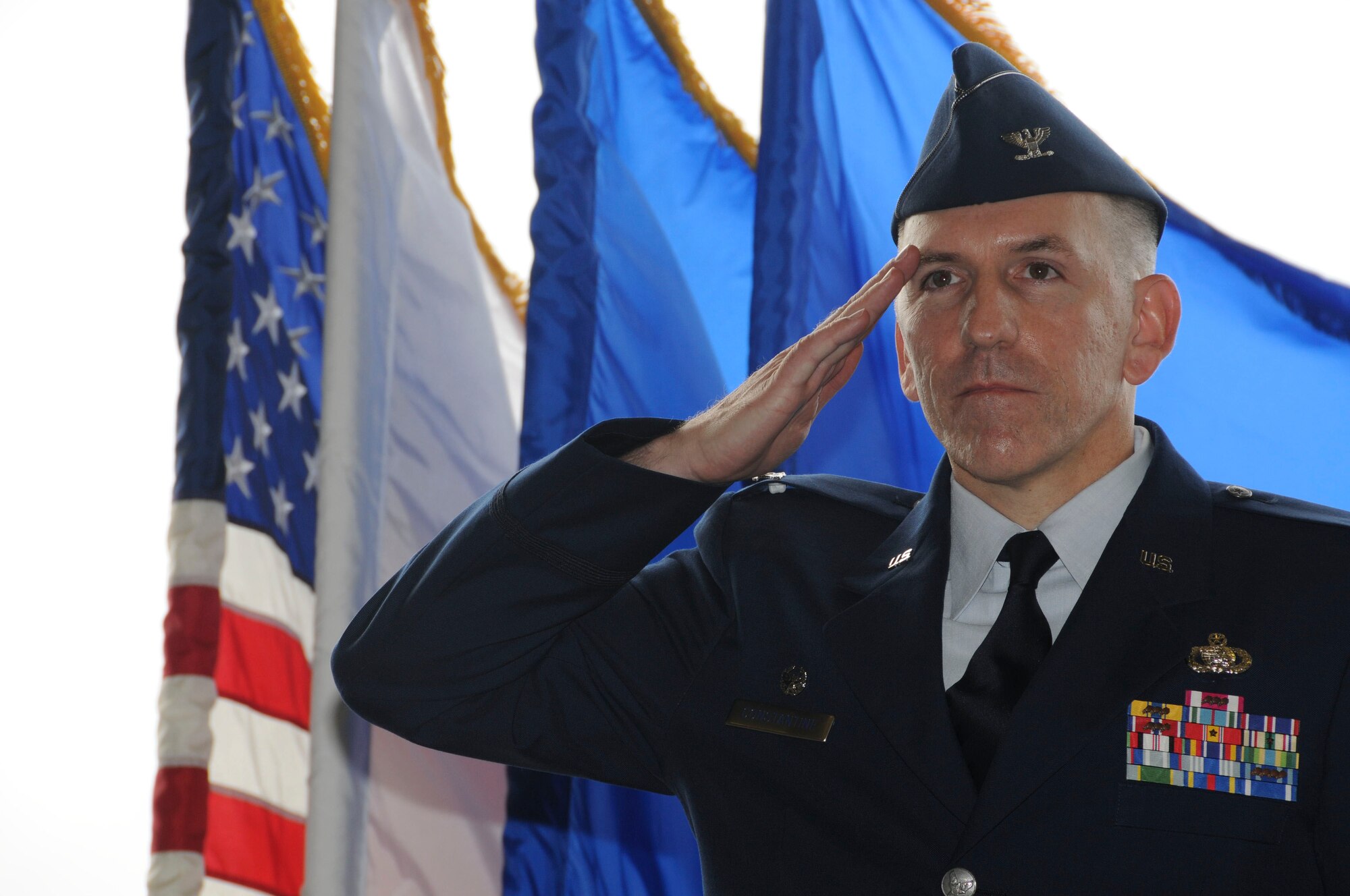 Col. Roftiel Constantine presents his first salute as commander of the 18th Mission Support Group during his change of command ceremony July 27. (U.S. Air Force photo / Staff Sgt. Darnell Cannady)