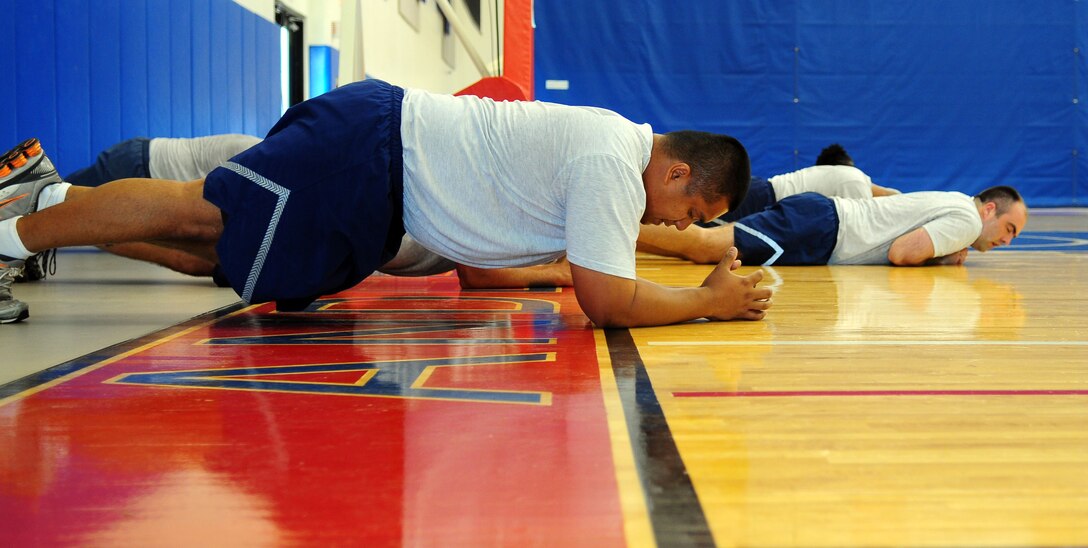 ANDERSEN AIR FORCE BASE, Guam - Fitness improvement program participants attend a work out session at the Coral Reef Fitness Center July 27. The program incorporates a variety of exercises and teaches individuals healthy eating habits. (U.S. Air Force photo by Airman Whitney Amstutz)