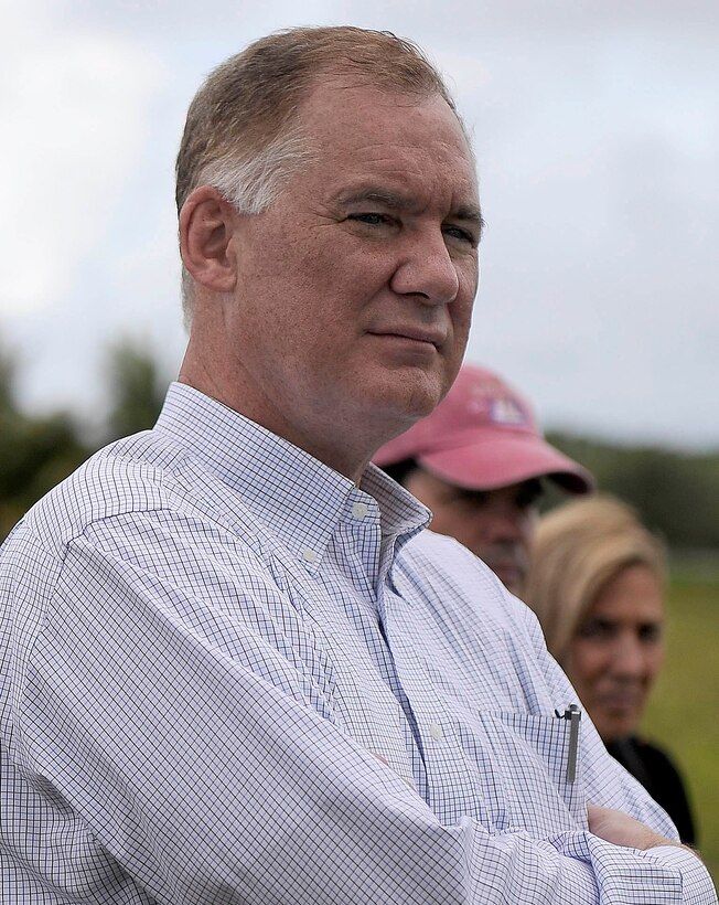 U.S. Deputy Defense Secretary William J. Lynn III tours the new Marine helicopter area on Andersen Air Force Base, Guam, with John Jackson, director of the Joint Guam Program Office, July 28, 2010.