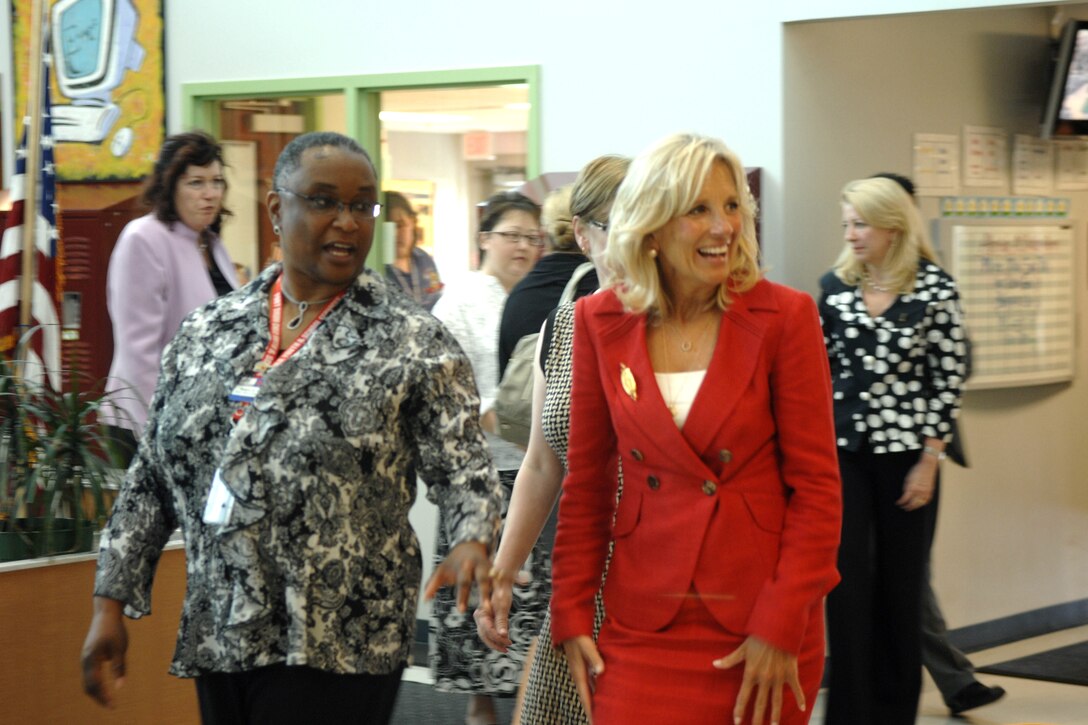 Dr. Jill Biden, wife of Vice President Joe Biden, gets a tour of the Chapel Drive School Age Center at Fort Drum, N.Y., from Robin D. Moor, the facility’s director, July 28, 2010. The center includes a gymnasium, a technology lab and a homework center, and provides recreational and developmental activities for children of Fort Drum soldiers, such as a summer camp that was in progress during Dr. Biden’s visit. 