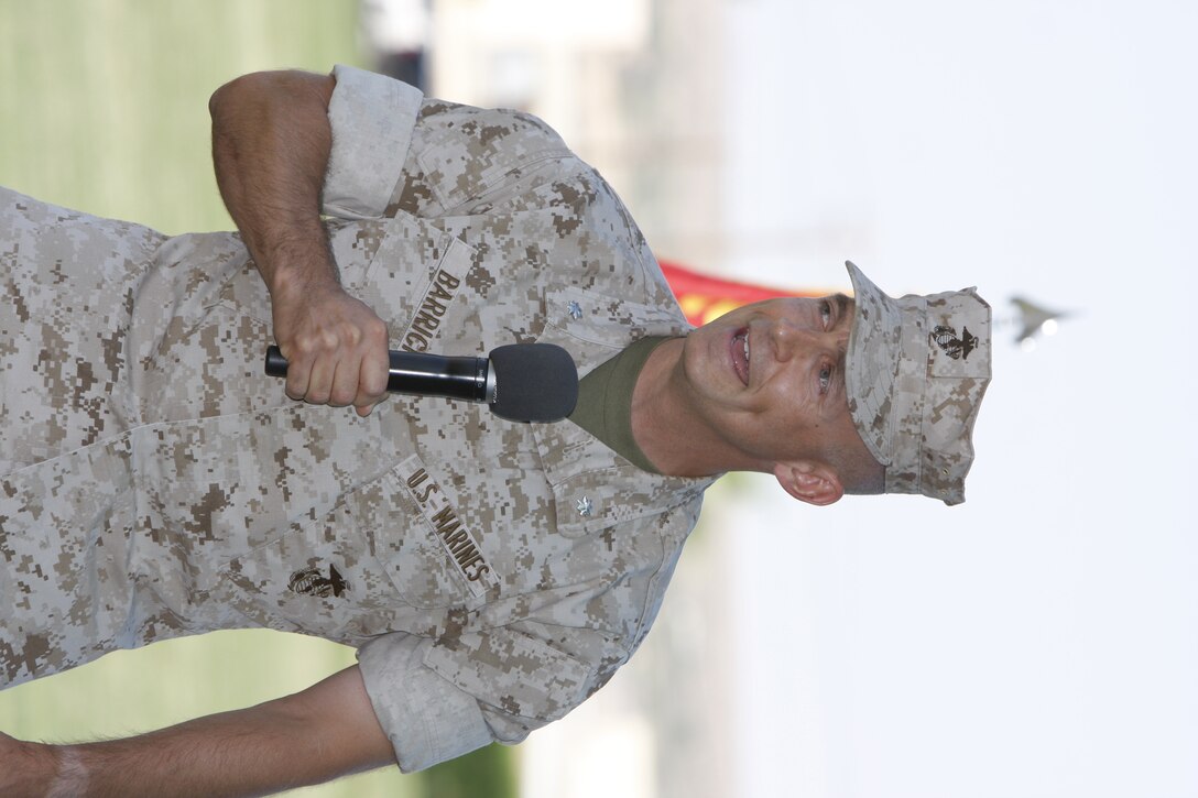 Lieutenant Col. Timothy Barrick, the commanding officer of 1st Tank Battaltion, gives a speech after assuming command from Lt. Col. Tom Gordon during a change of command ceremony at Lance Cpl. Torrey L. Gray Field July 29. Gordon is returning to his native city of Boston where he will serve as the security fellow for the Massachusetts Institute of Technology.