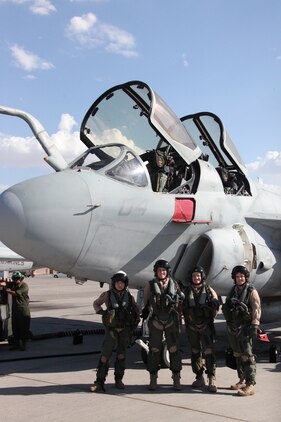 Female Marines of Marine Tactical Electronic Warfare Squadron 3 prepare to embark on the first known all female EA-6B Prowler flight. (Left to Right) Capt. Aleah A. Larson, an electronic countermeasures officer with VMAQ-3, Capt. Jill L. Stephenson, pilot with VMAQ-3, Maj. Melissa P. Kelley, an ECMO with VMAQ-3, Capt. Tracey N. Smith, an ECMO with VMAQ-1.