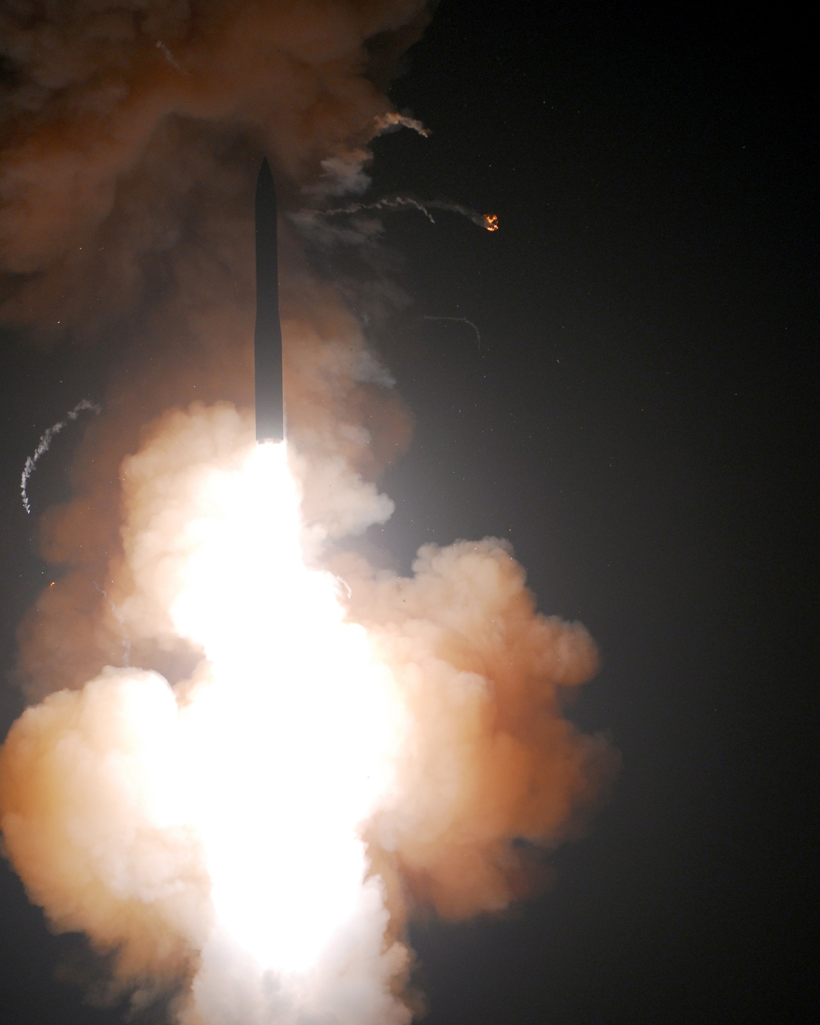A Minuteman III intercontinental ballistic missile launches here June 16, 2010, from Vandenberg Air Force Base, Calif. The missile's single re-entry test vehicle traveled approximately 4,190 miles before hitting its pre-determined target near the Kwajalein Atoll in the Marshall Islands. (U.S. Air Force photo/Joe Davila)