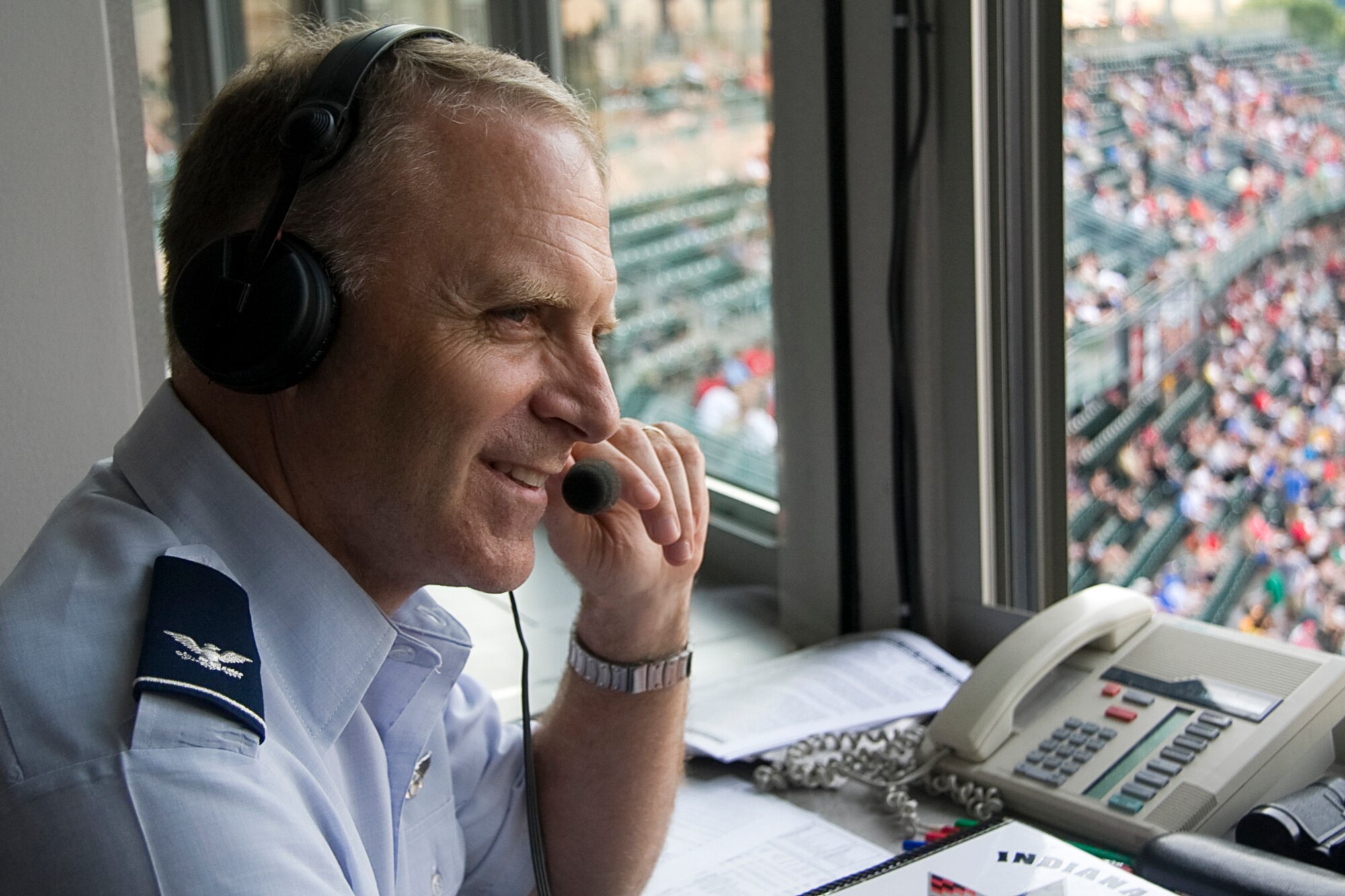 GRISSOM AIR RESERVE BASE, Ind. -- During a radio interview, Col. Tim Cox discusses the many benefits of being an Air Force Reservist. Colonel Cox, the 434th Air Refueling Wing vice commander, gave the interview after throwing out a ceremonial first pitch at the game July 22. (U.S. Air Force photo/Tech. Sgt. Mark R. W. Orders-Woempner)