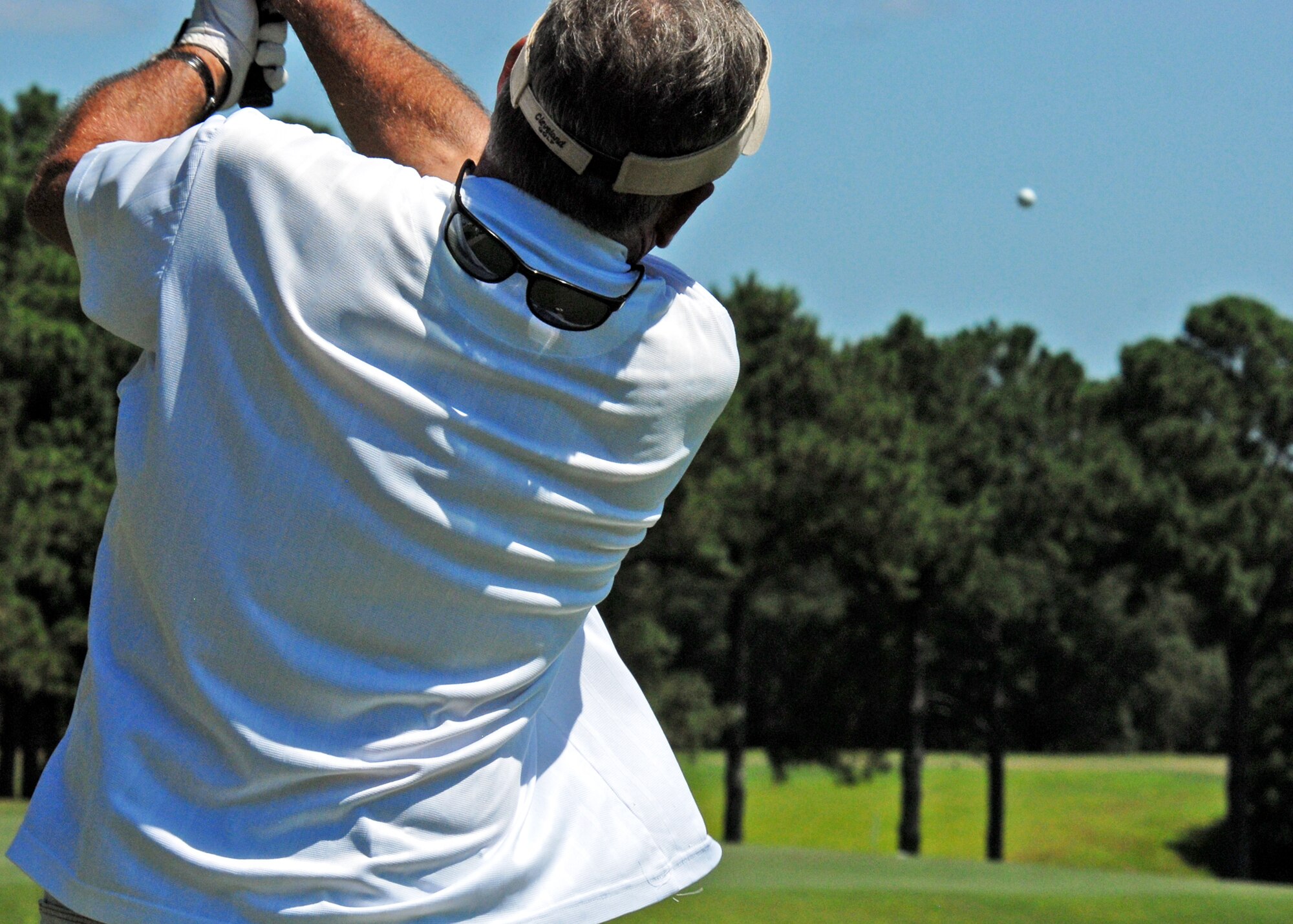 Steve Fish, 53rd Wing, drives off the first tee during the base intramural golf championship July 28 at the Eglin golf course.  Perennial rivals, 53rd Wing and Air Force Research Lab, faced off in the championship match, with AFRL winning 8-4.  The AFRL team has claimed the base title three years straight.  (U.S. Air Force photo/Samuel King Jr.)
