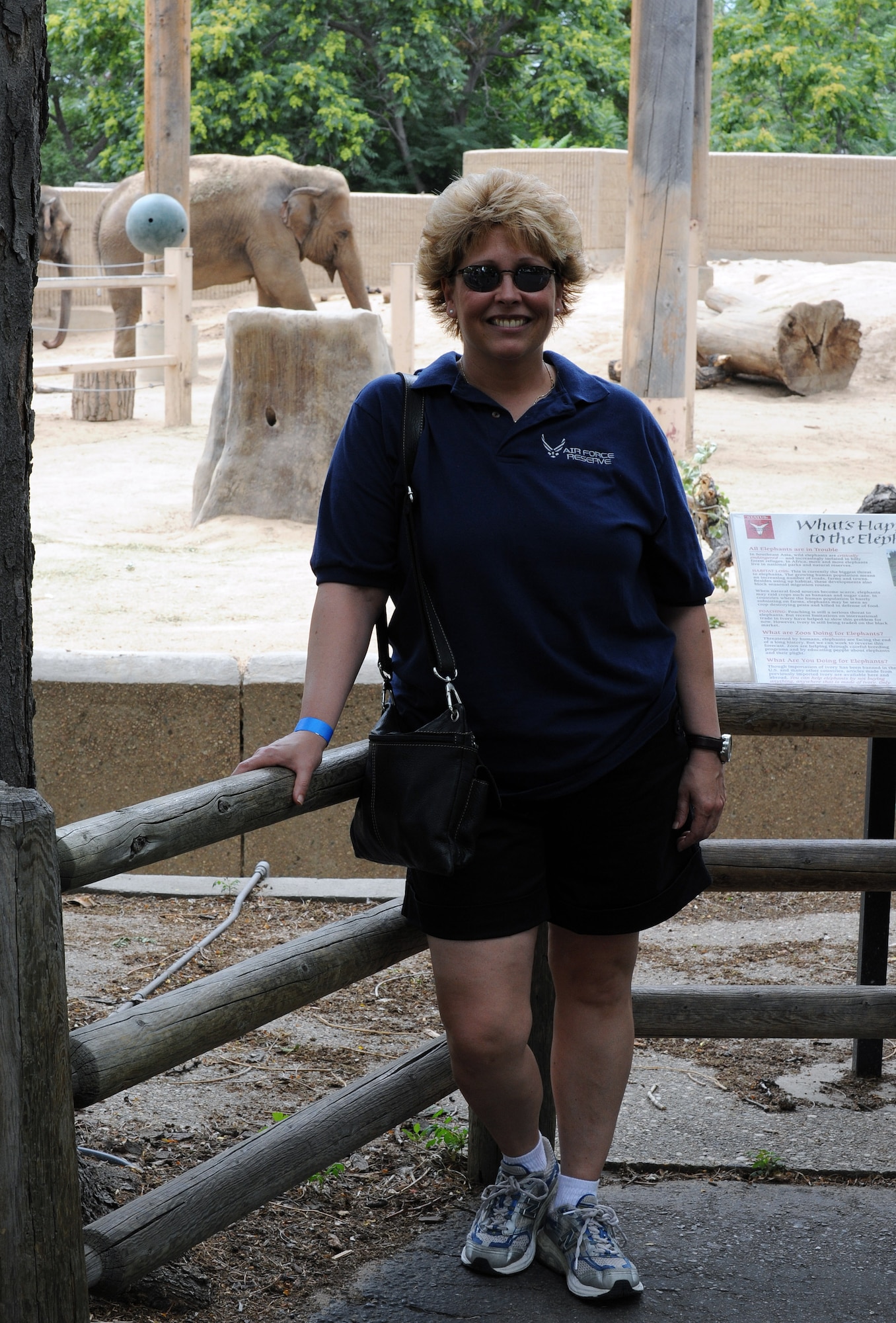 Master Sgt. Karen Perrault stands at the elephant exhibit at the Denver Zoo during ARPC's annual summer picnic July 22. Nearly 200 people attended this year's Summerfest. (U.S. Air Force photo/Kevin Bell)